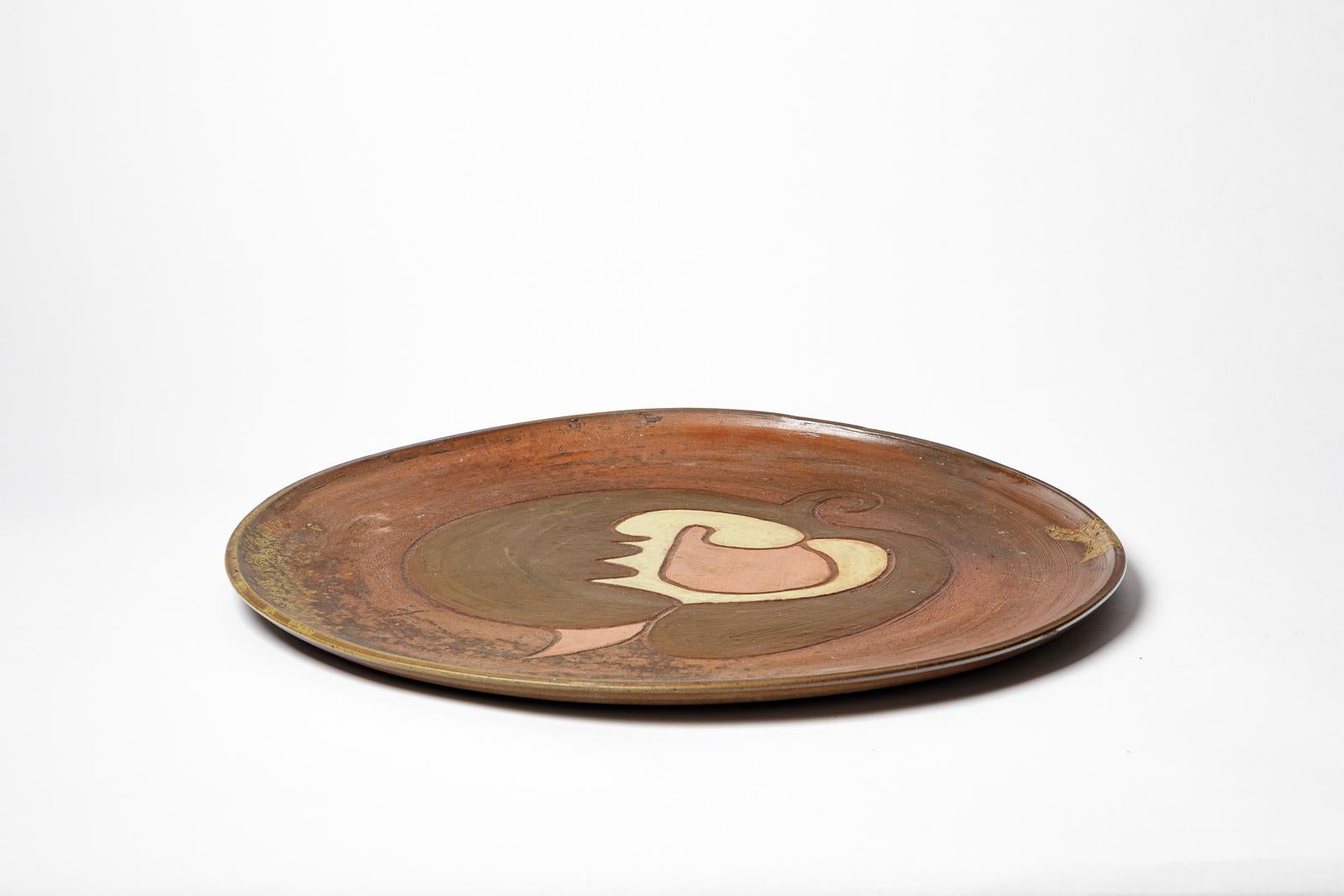 Stoneware sculptural plate with geometric decoration by Georges Martin. 
Artist signature on the base. Circa 1970-1980. Unique piece.
H : 18.7 x 0.9 inches.