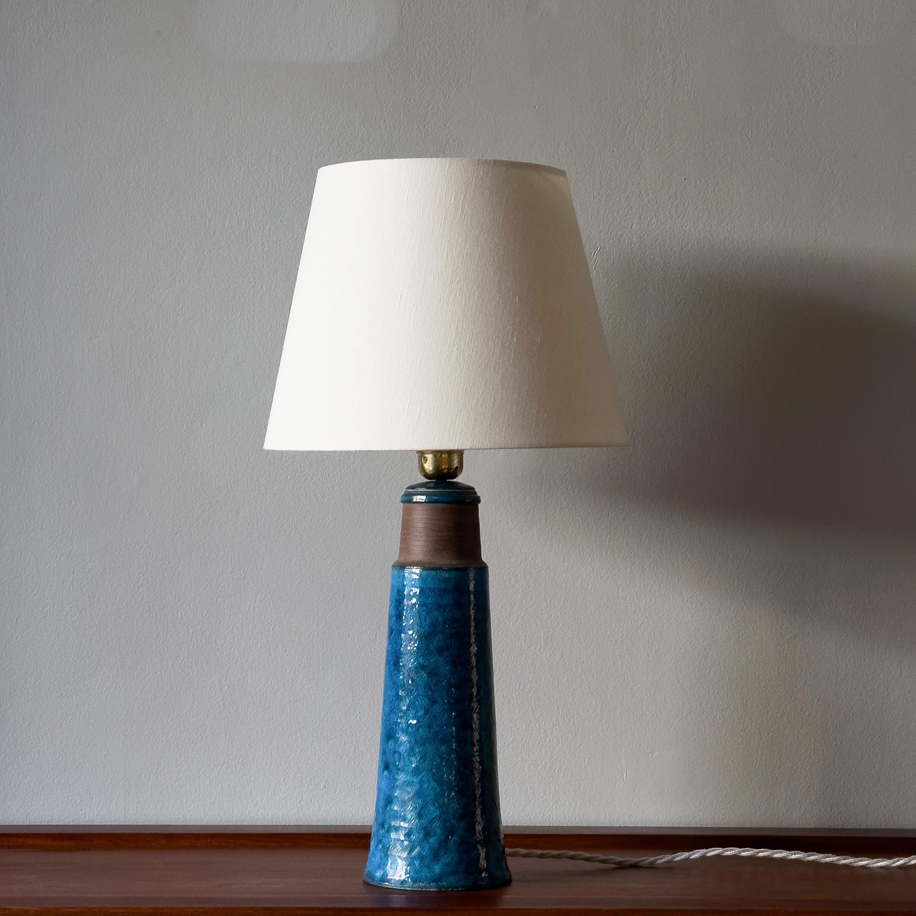 A stoneware table lamp designed by Nils Kähler for Herman A. Kähler Keramik, the family workshop founded by his great grandfather in 1839 and which he, 