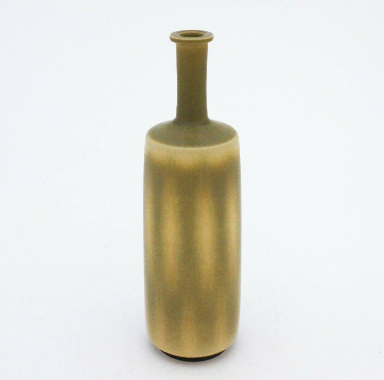 A yellow and green/grey vase designed by Berndt Friberg at Gustavsberg in Stockholm, the vase is 16,5 cm high. It ´s marked as on picture and it is in mint condition.
