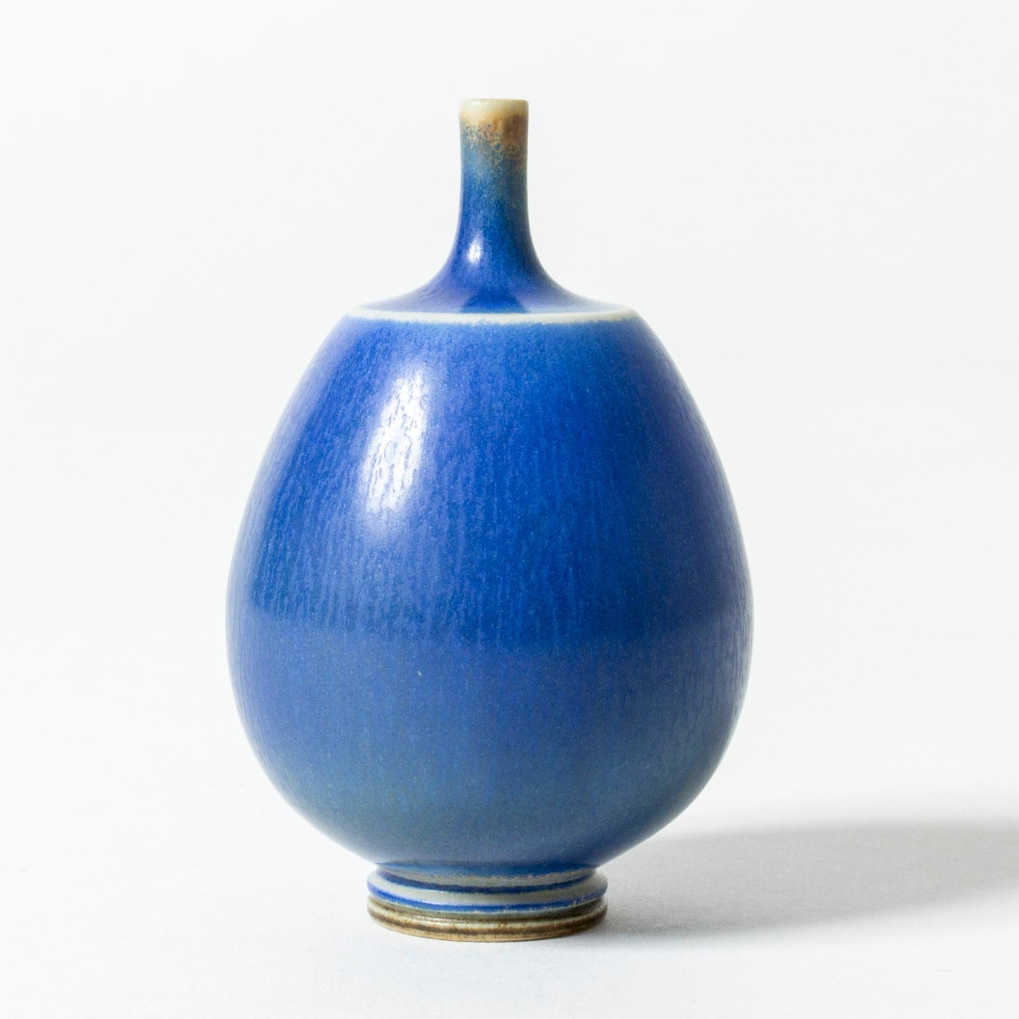 Lovely miniature stoneware vase by Berndt Friberg, in a plump form with a tiny neck. Dark blue hare’s fur glaze. Vibrant blue hare’s fur glaze.

Berndt Friberg was a Swedish ceramicist, renowned for his stoneware vases and vessels for Gustavsberg.