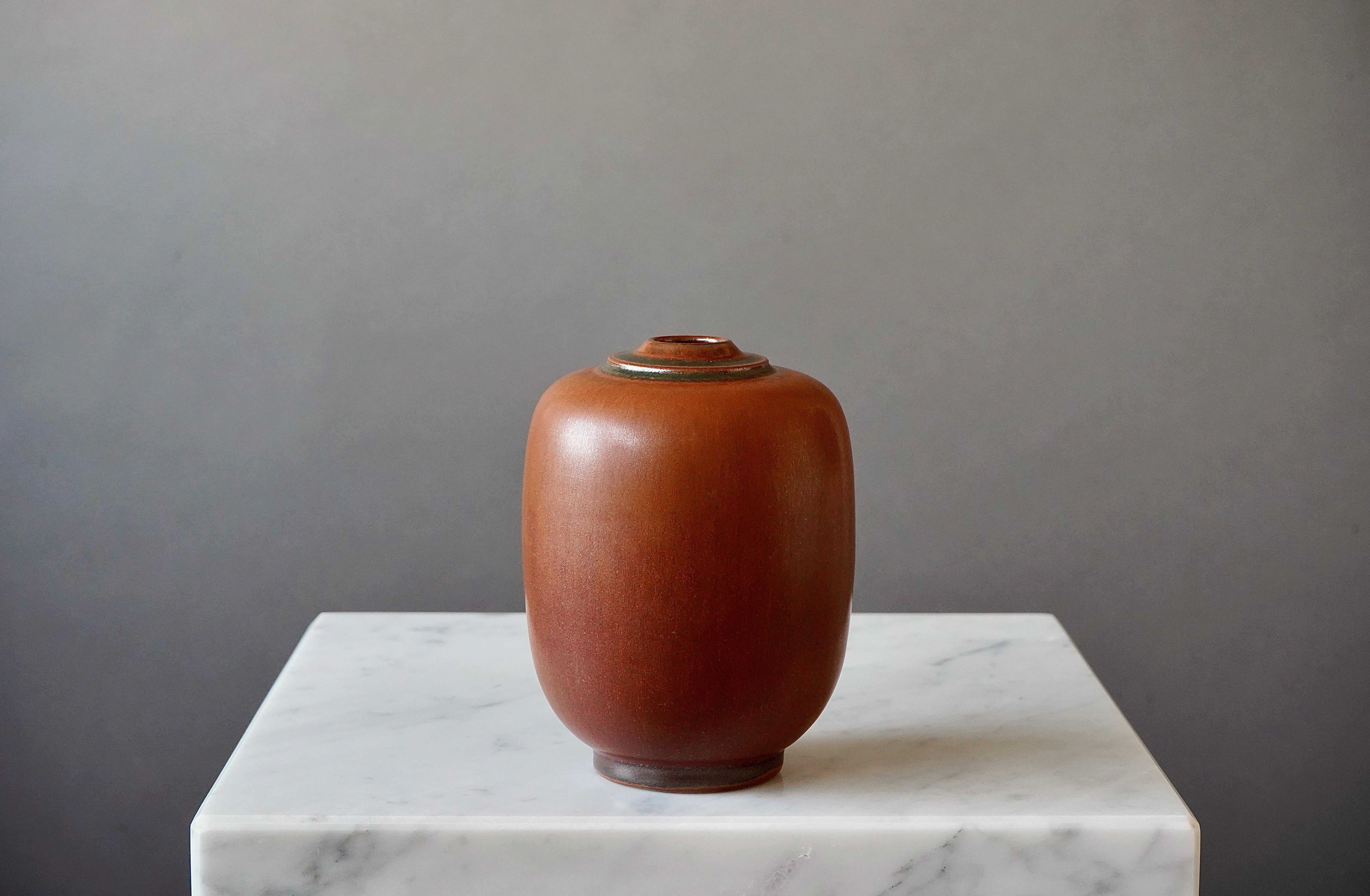 Beautiful stoneware vase made by master ceramists Erich and Ingrid Triller.
This piece was created at their workshop in Tobo, Sweden, 1950s.

Excellent condition. Signed on the base with their customary 