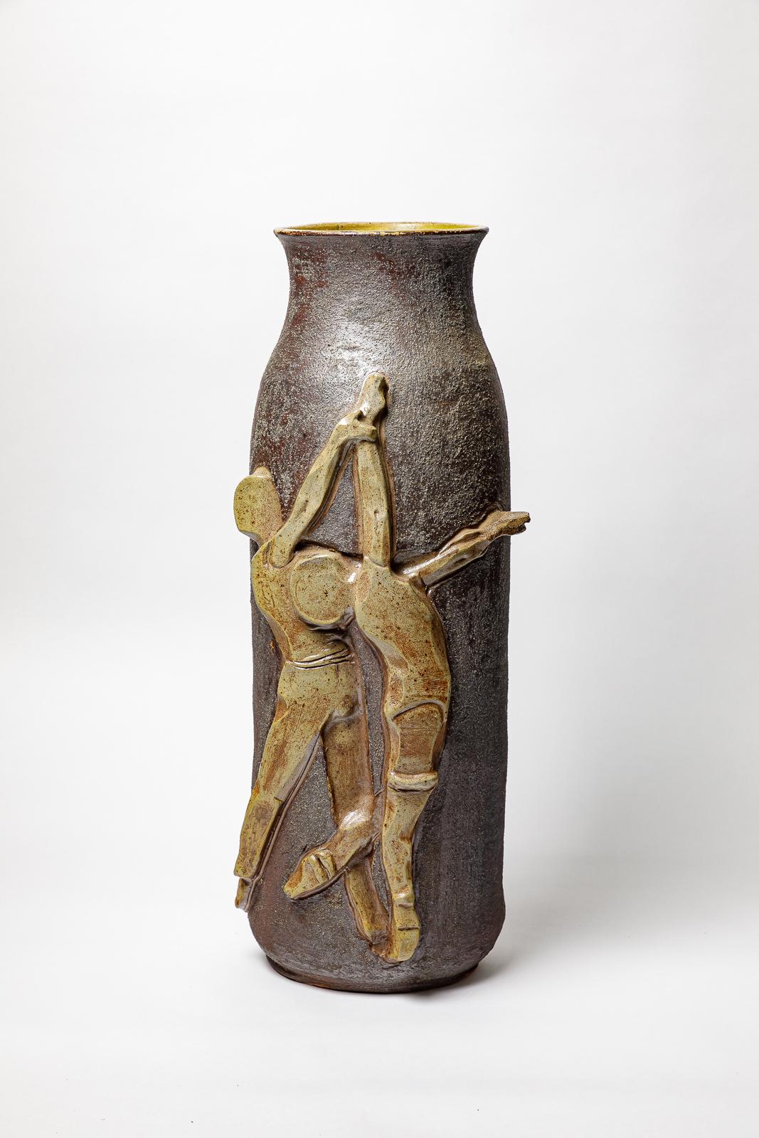 Stoneware vase by Georges Martin.
Artist monogram on the base. Circa 1970-1980.
H : 23.6 x 6.1 x 7.5 inches.