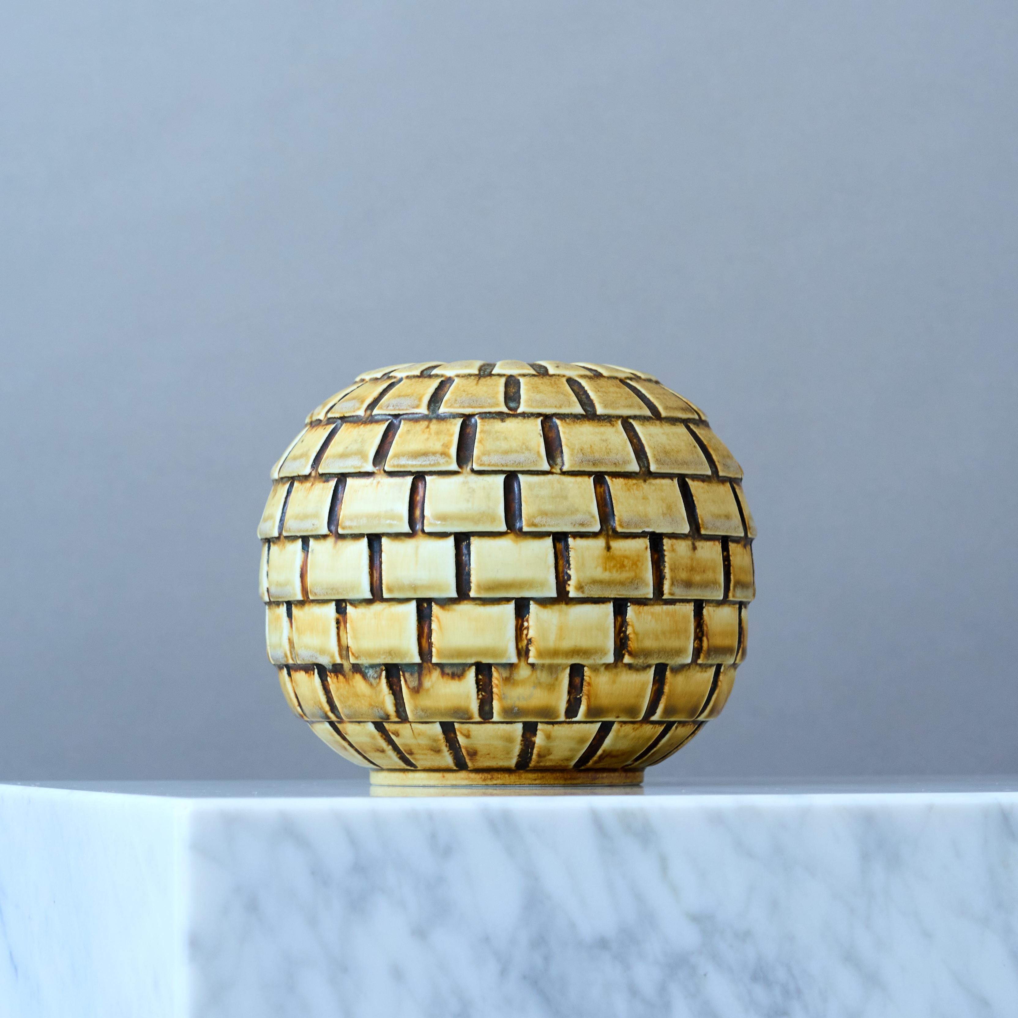 Stunning and rare stoneware vase designed by Gertrud Lönegren.
This studio piece was created at Rorstrand in Sweden between 1936-41.
Art Deco / Swedish Grace.

Great condition. Firing crack from production (under the glaze) to the top rim