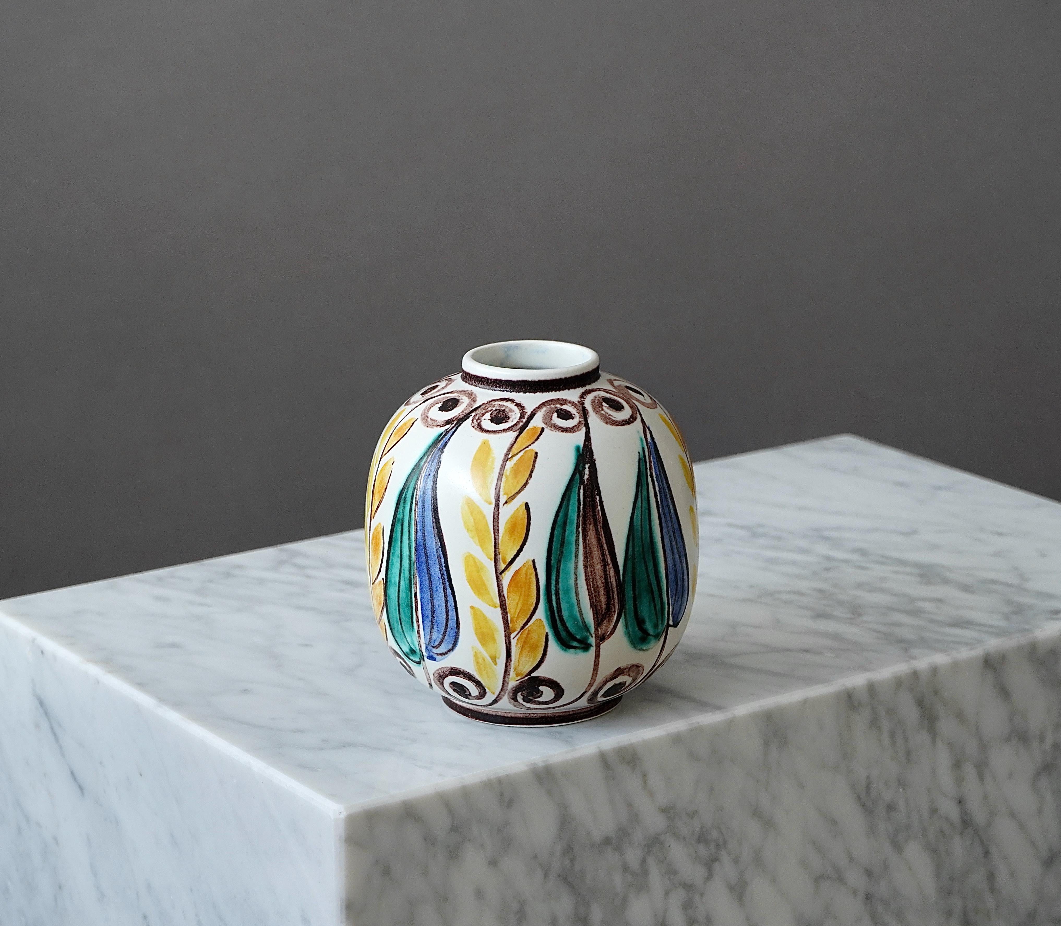 A beautiful stoneware vase with amazing glaze.
Made by Hertha Bengtson for Rörstrand, Sweden, 1950s.

Excellent condition.
Signed 'Bengtson' and 'R' för Rörstrand.

Hertha Bengtson (1917-1993) is one of the well-known representatives of the