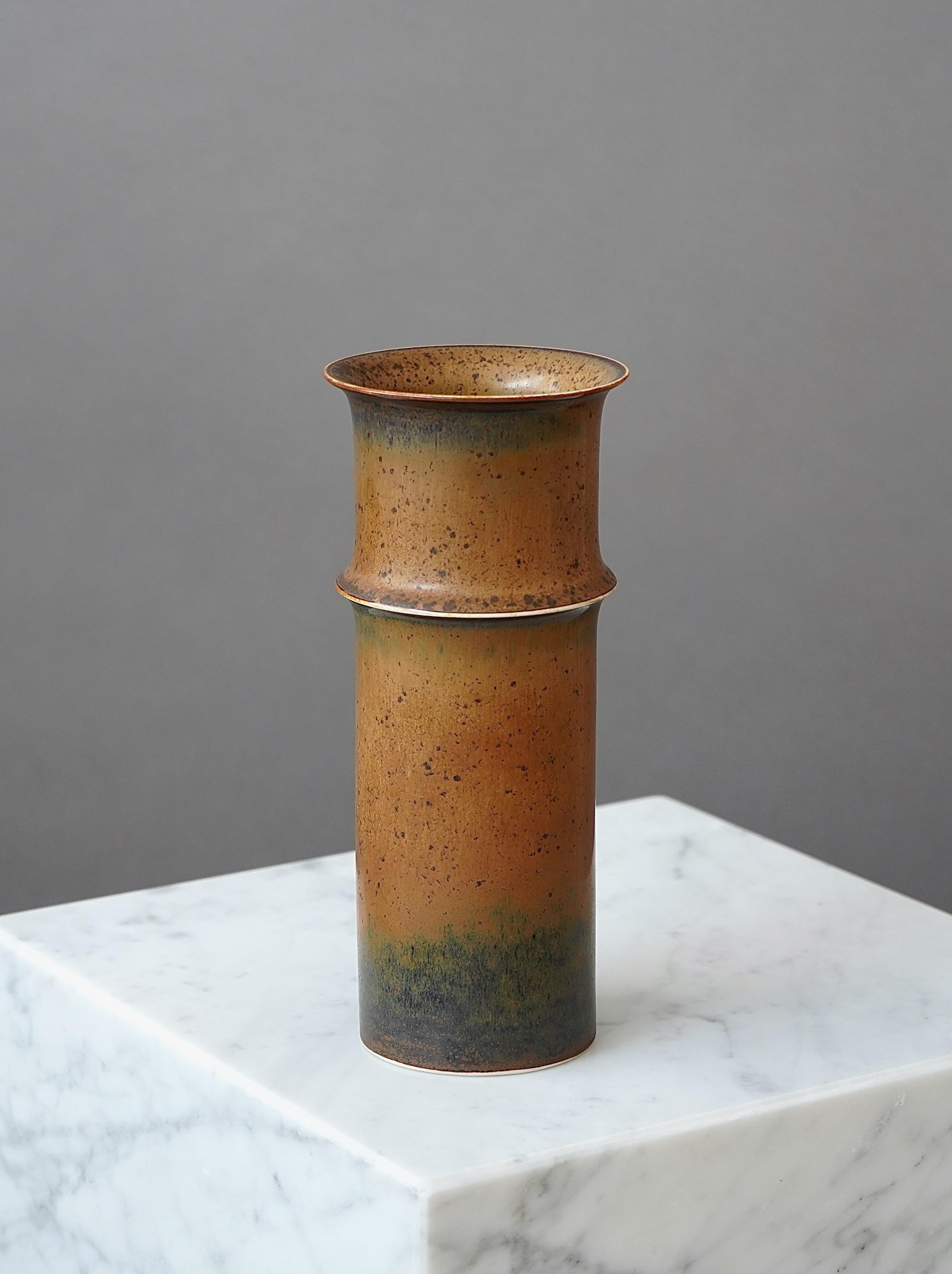 A beautiful stoneware vase with amazing glaze.
Made by Stig Lindberg in Gustavsberg Studio, Sweden. 1950s. 

Excellent condition. 
Impressed 