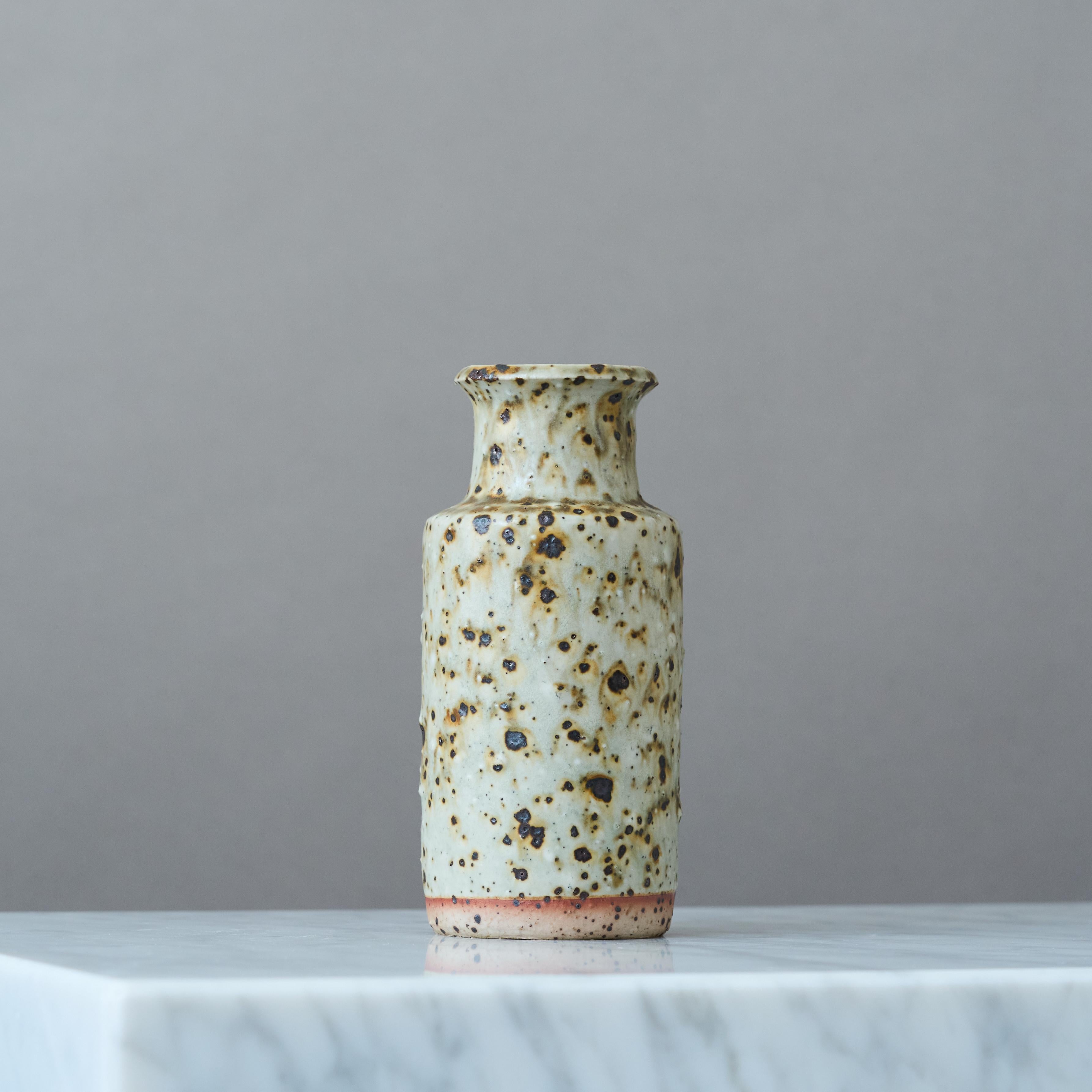 A beautiful and unique stoneware vase with amazing glaze. 
Made by Rolf Palm, in the artist's studio, Mölle, Sweden, 1982.

Great condition. Incised ’Palm / Mölle / H2’.

Rolf Palm (1930–2018) was one of Sweden’s leading ceramic artists in the 20th