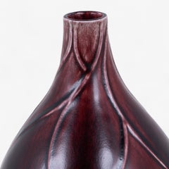 Stoneware vase in oxblood glaze by Axel Salto