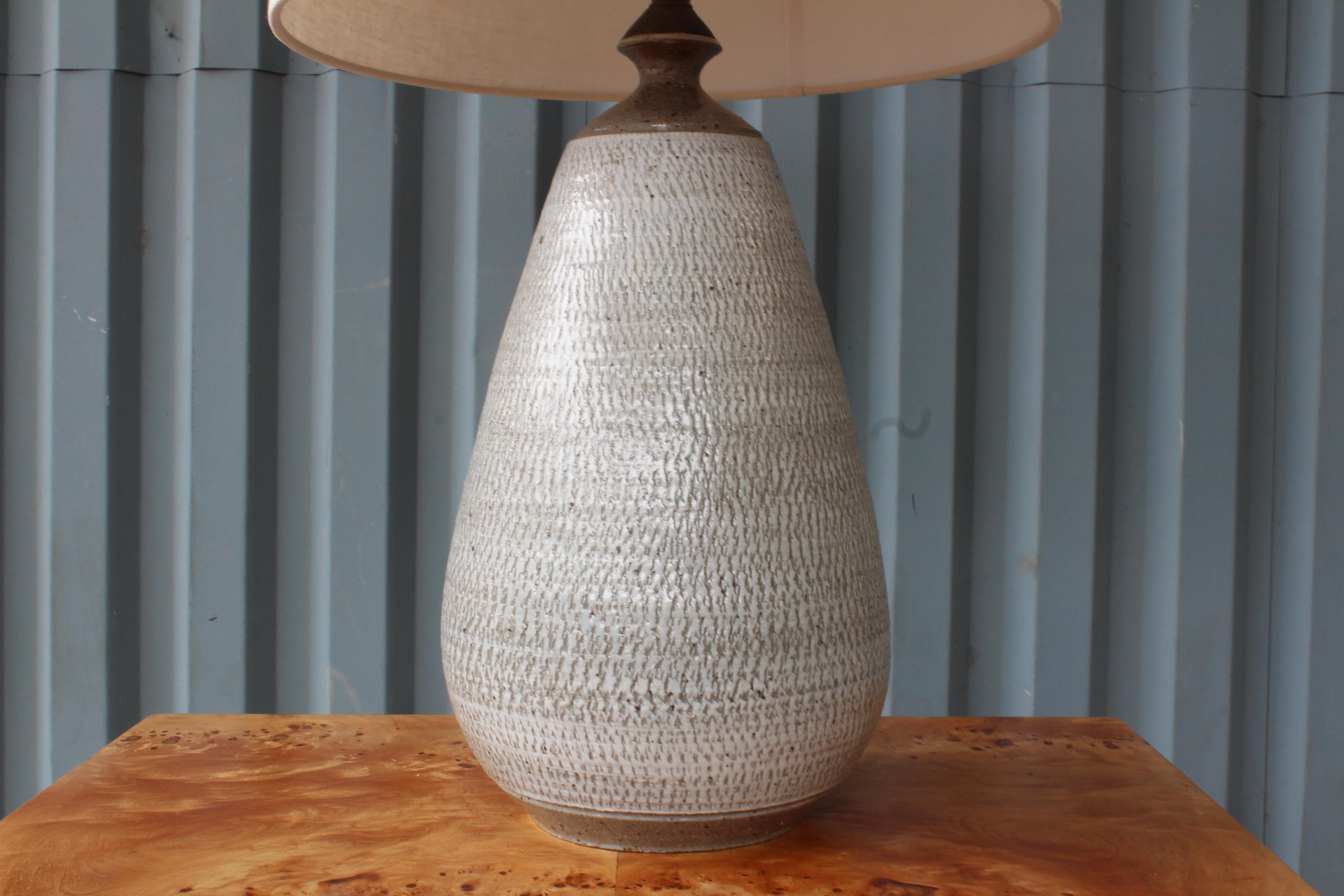 Vintage 1960s stoneware vase lamp. Newly rewired and fitted with a custom linen shade.
   