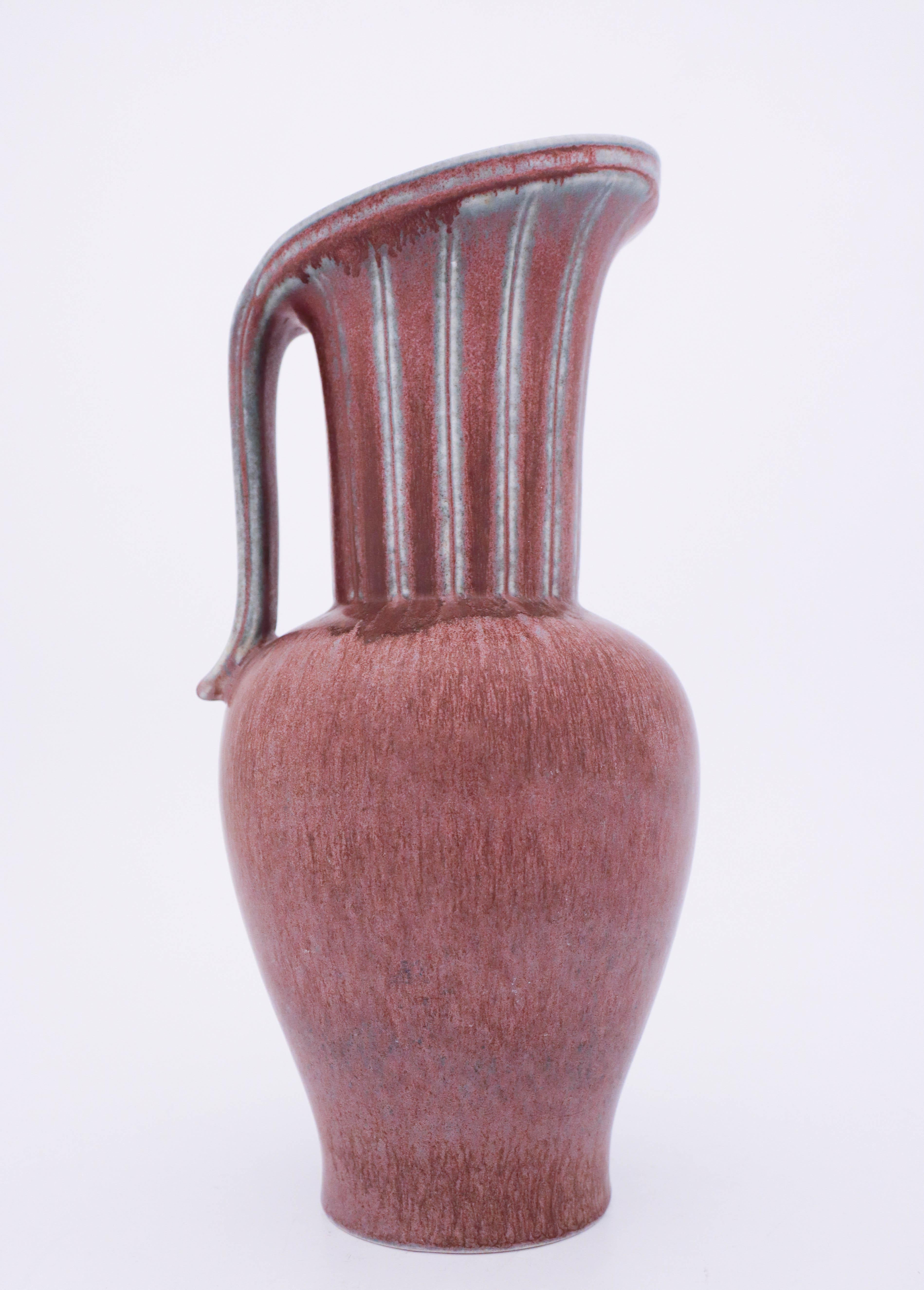 A vase designed by Gunnar Nylund at Rörstrand, the vase is 35 cm high and it is in mint condition.