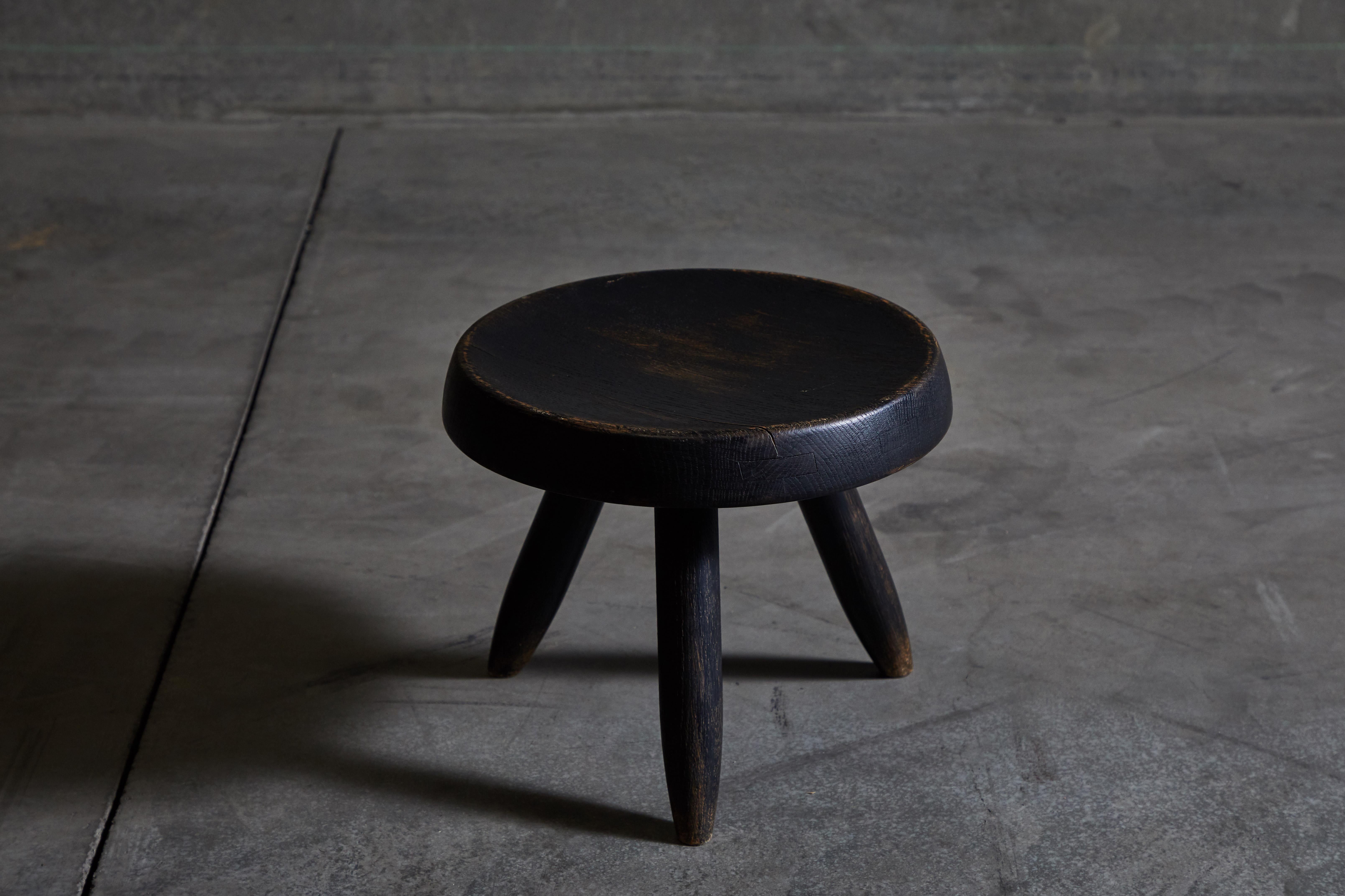 Rare black wood stool by Charlotte Perriand for Galerie Steph Simon. Made in France, circa 1950s. 

literature: Charlotte Perriand Complete Works Volume 2: 1940-1955, Barsac, pg. 458 Les Décorateurs Des Années 50, Favardin, pg. 137 Charlotte