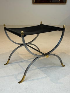 Stool by la maison Charles in stainless steel, brass and leather