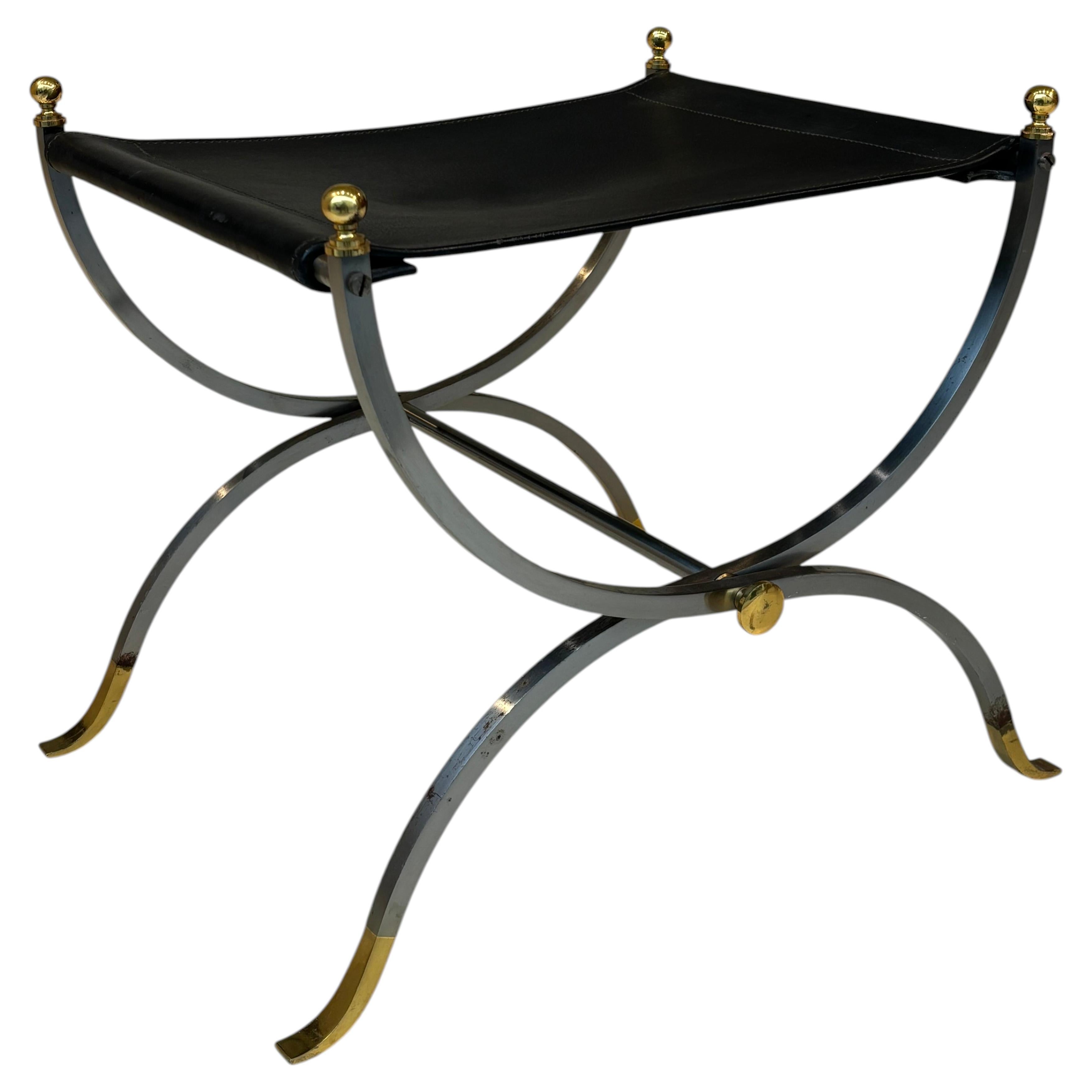 Stool by la maison Charles in stainless steel, brass and leather