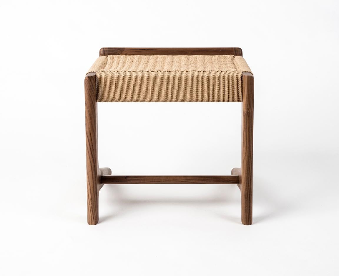 Mid Century inspired Rian Cantilever Stool made out of walnut hardwood and danish cord. Custom sizes available. Can be made with any domestic or exotic hardwood of your choosing. Danish cord comes in three colors: Kraft (Natural), white and black.