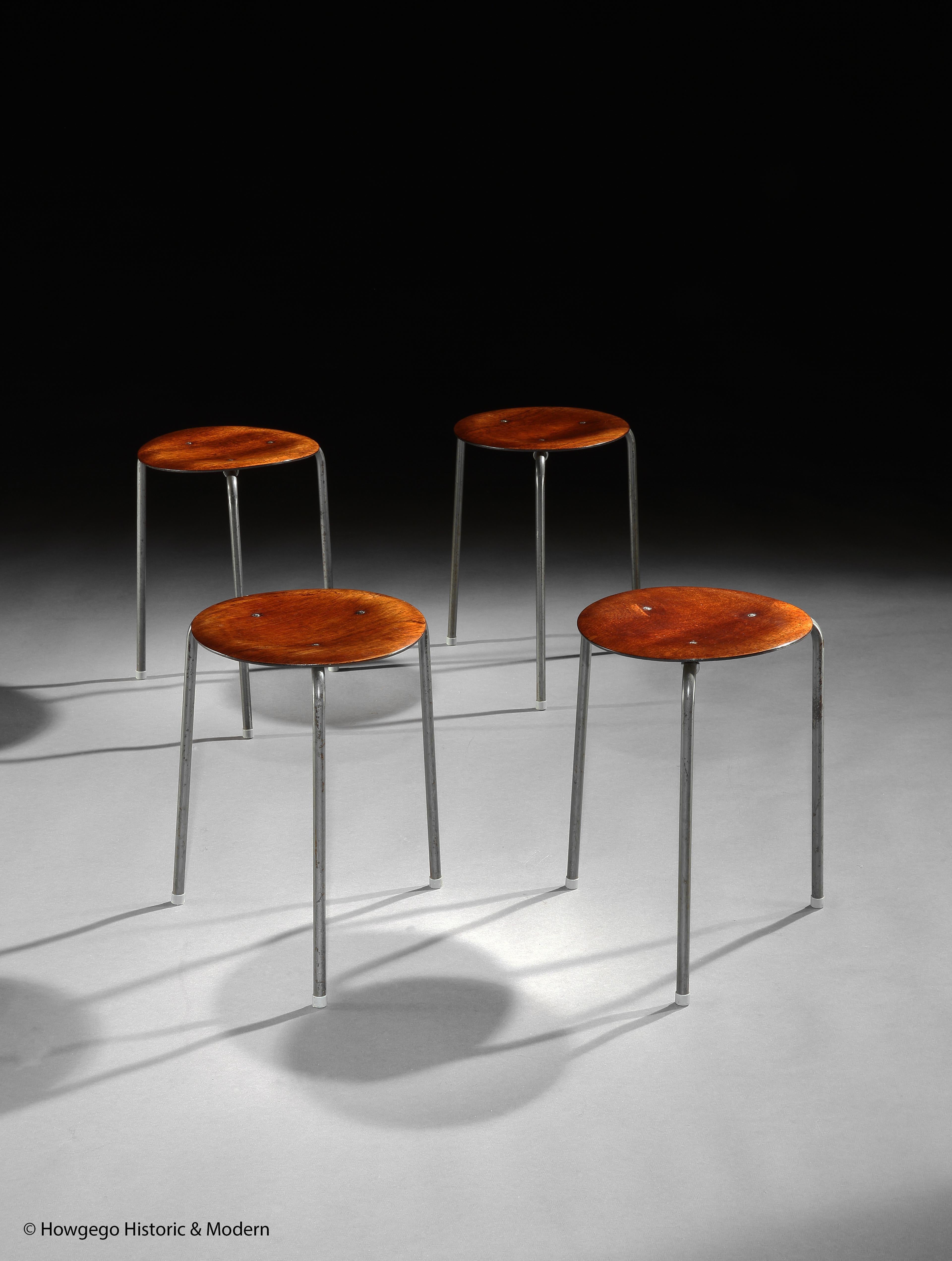 - Exceptional set of four, Mid-Century Modern Dot stools in original condition with teak seats on three chrome legs with the original grey plastic cappings on the feet.
- These dot stools inject Classic elegance into an interior and are suitable