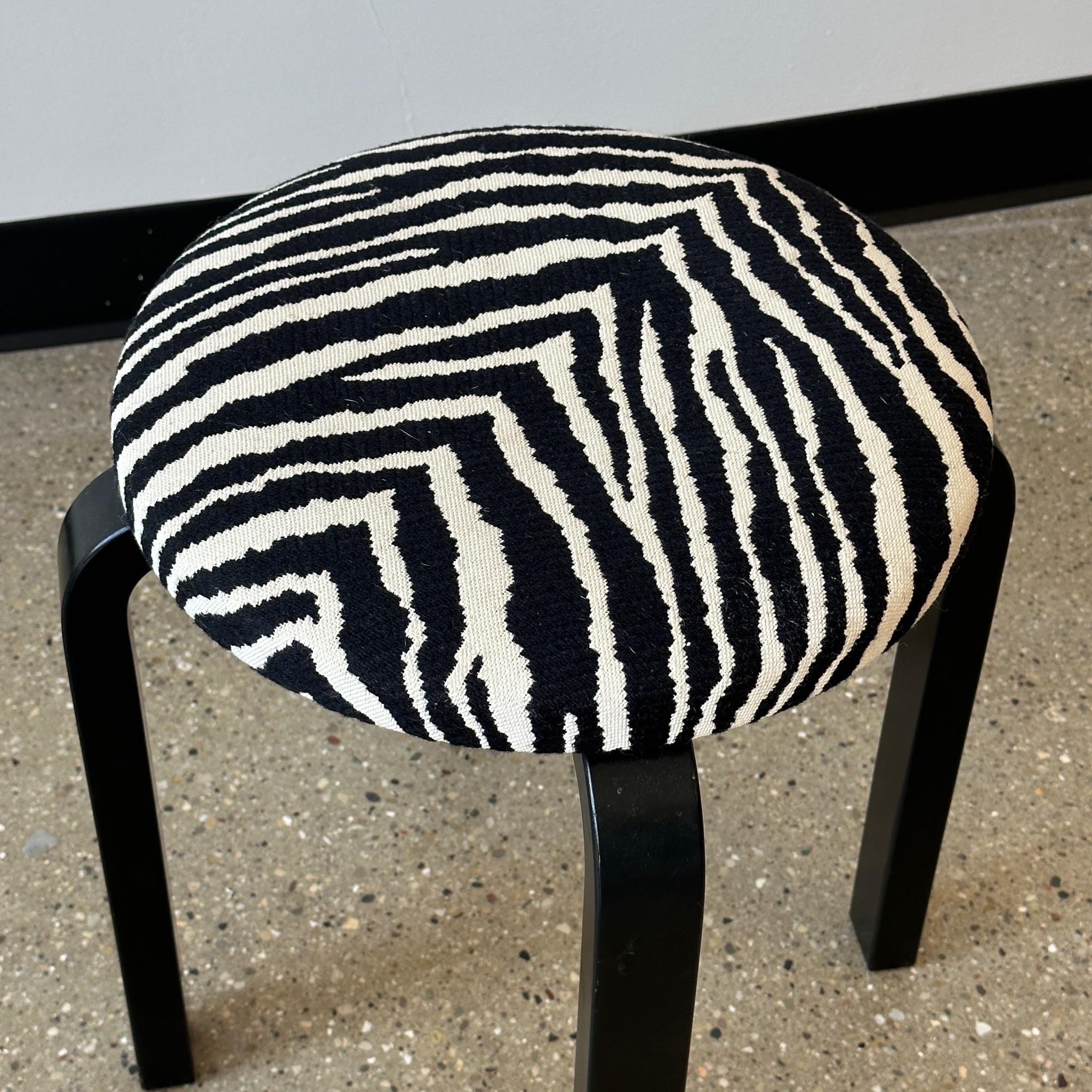 c. 2018. Price is for the set. Contact us if you’d like to purchase a single item. Stackable. Made by Artek. Upholstered in original Artek Zebra fabric. 

