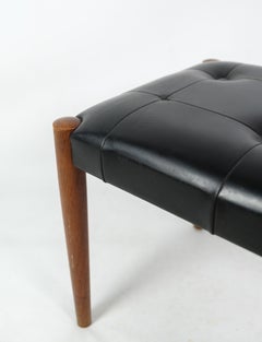 Sgabello in teak e pelle nera di Erik Jørgensen, design danese degli anni '60