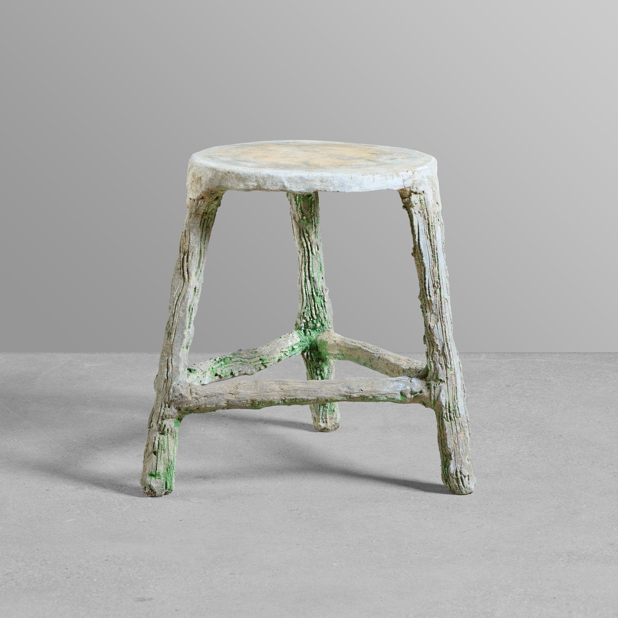 Faux bois three legged stool or side table.

