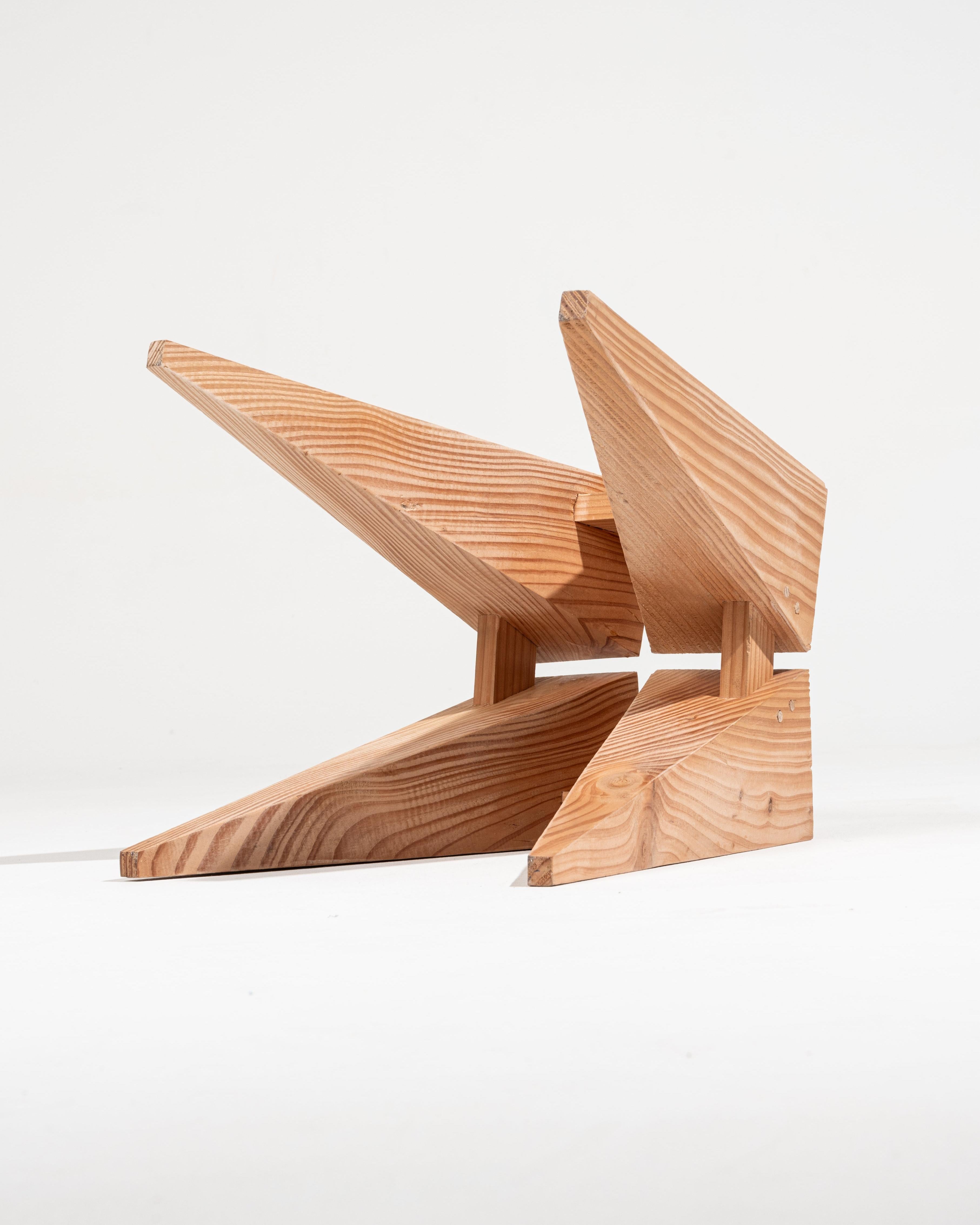 Stool in carved wood by artist Grégoire Thibault, featuring a conical quadripod base and a slightly curved seat. Each piece is unique, with natural variations in the wood’s tone and appearance due to its handcrafted production.
DV2454-2456