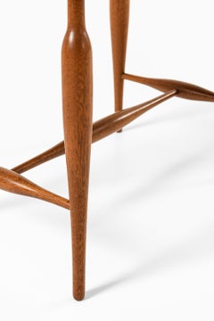 Tabouret en acajou, laiton et cuir par Josef Frank, années 1950