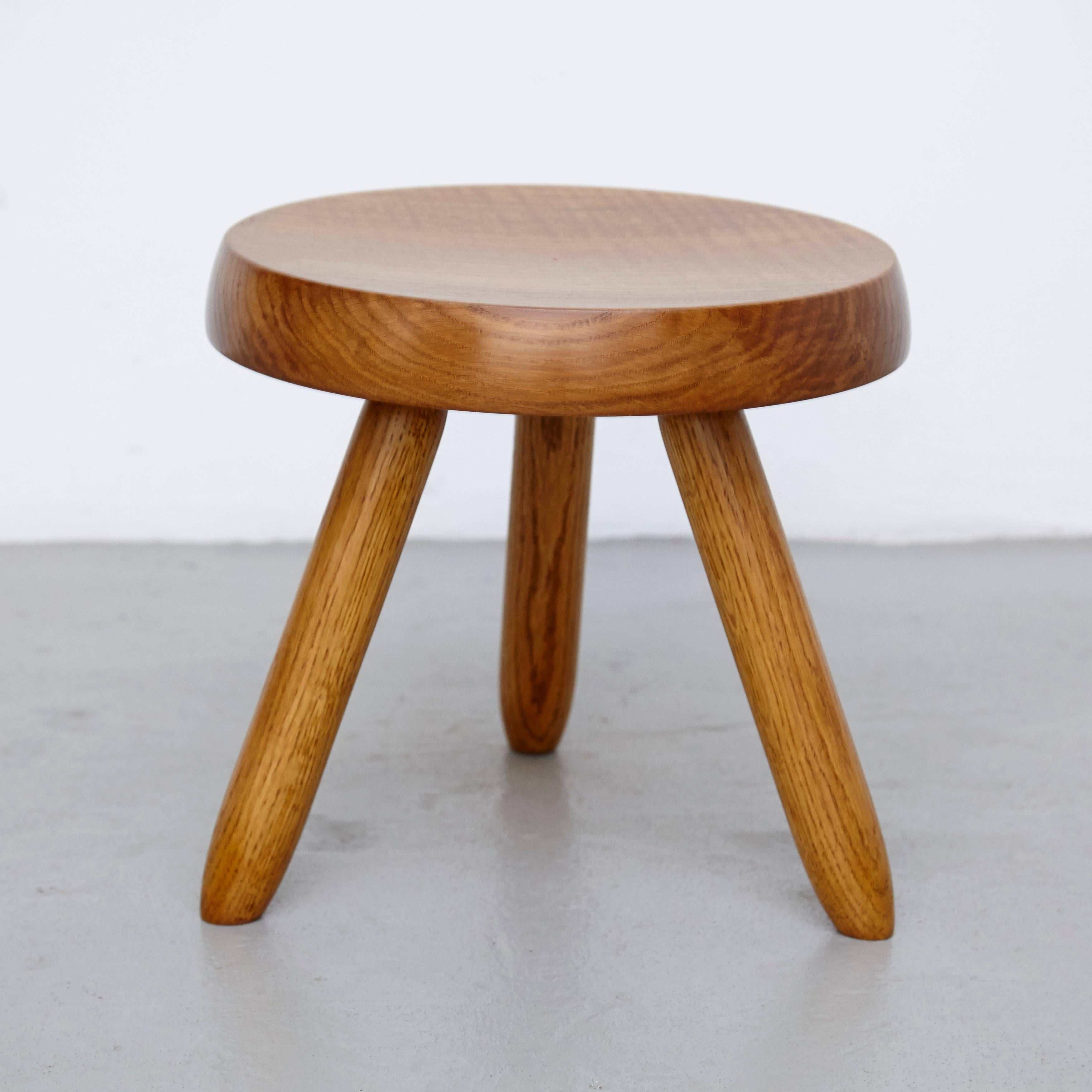 Stool designed in the style of Charlotte Perriand.
Made by unknown manufacturer.

In good original condition, preserving a beautiful patina, with minor wear consistent with age and use. 

Charlotte Perriand (1903-1999) She was born in Paris in