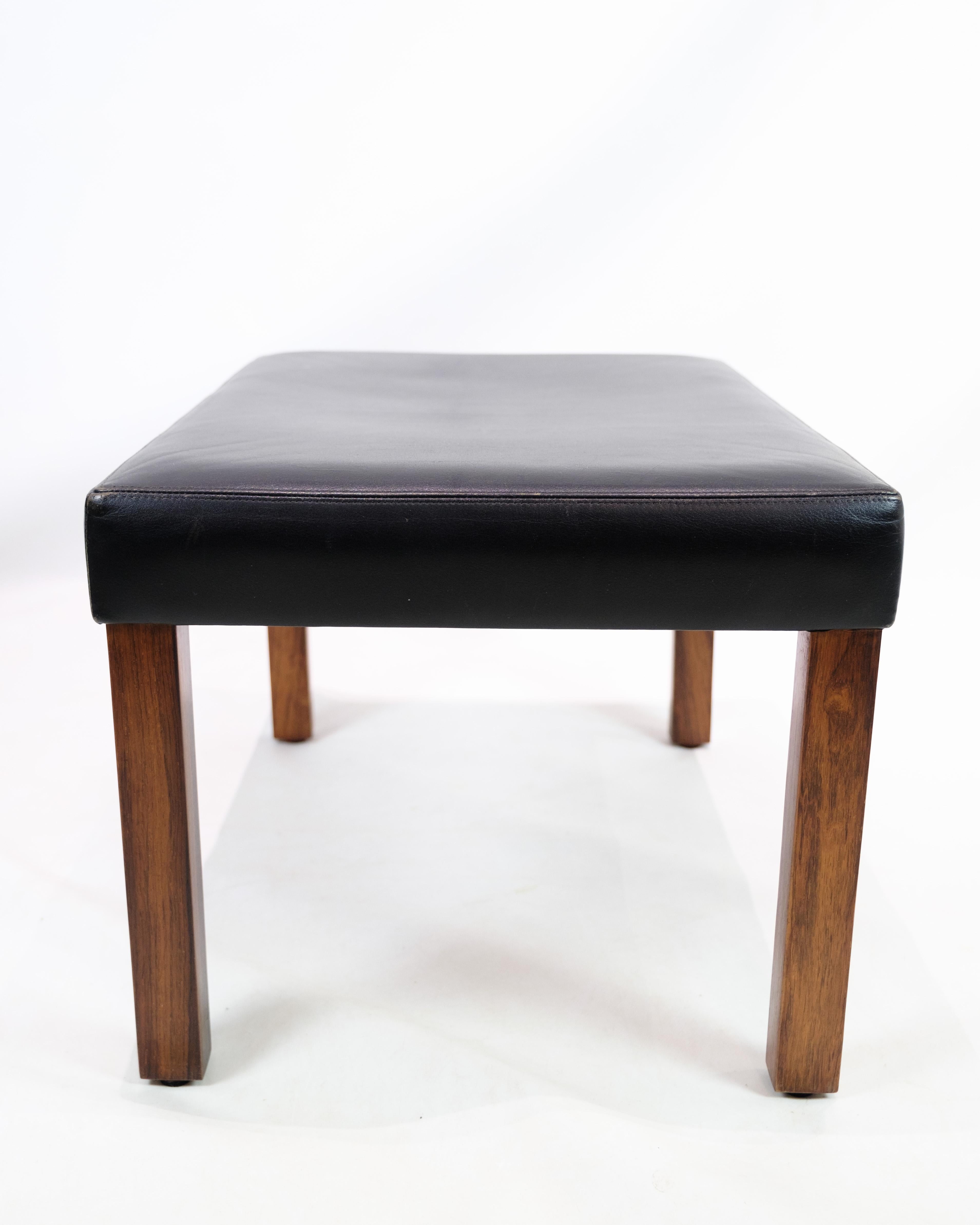Mid-Century Modern Stool Made In Black Leather With Rosewood Legs, Danish Design From 1960s For Sale