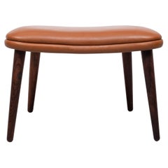 Taburete modelo 91 diseñado por Illum Wikkelsø. Producido por Michael Laursen en Aarhus