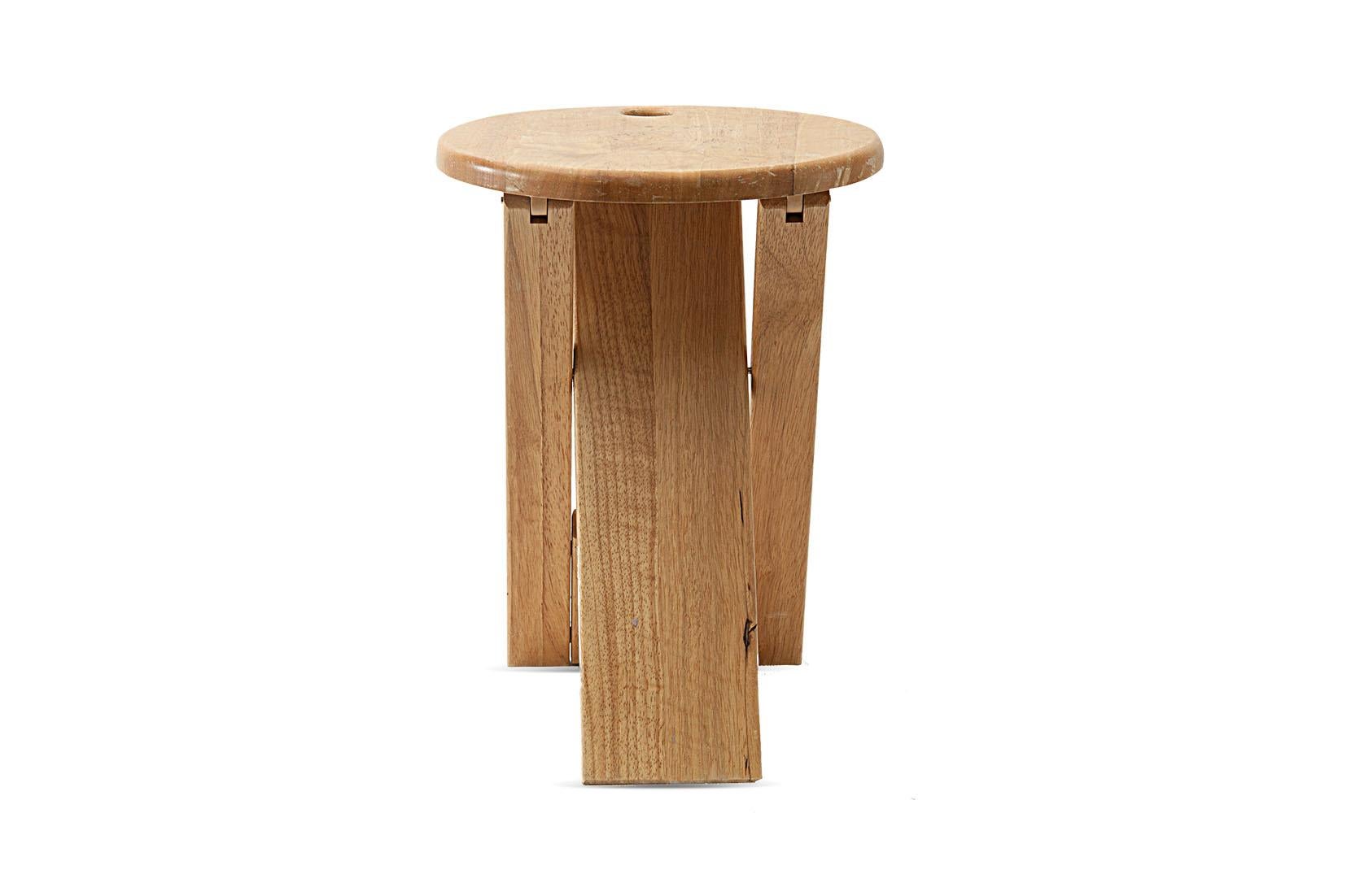 This stool is the model TS by Roger Tallon. It has been made in 1970 for the Santou gallery, in France.
The wood is beechwood, and the stool is foldable.
Approximate measures:
Diameter 30 cm
Height 42 cm.