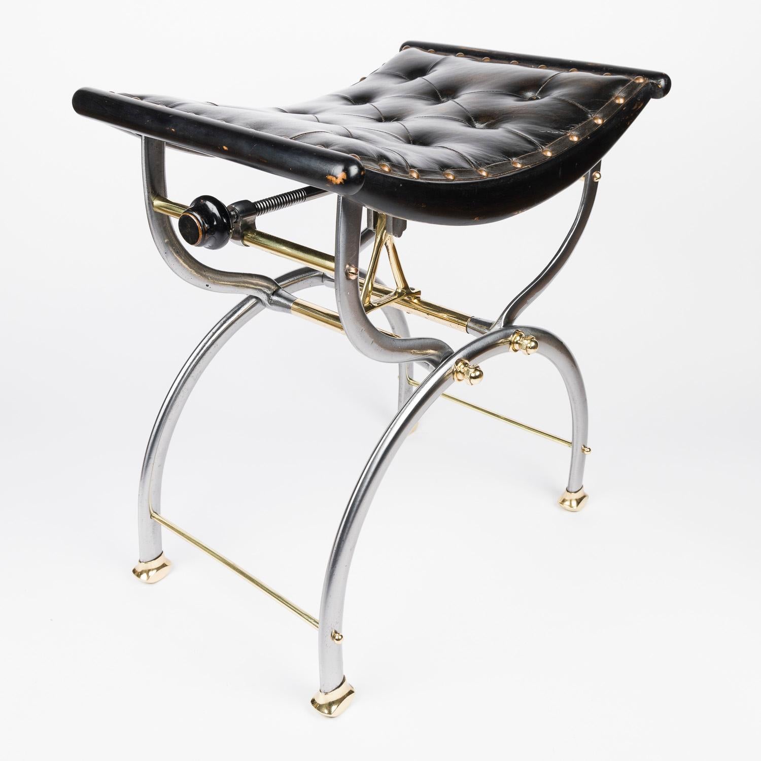 A steel and brass Victorian patent stool of adjustable height by C. H. Hare and Sons of Birmingham. 

Seat height adjusts by turning the handles underneath the sides of the seat. 

Frame marked: C.H. Hare & Sons Patent App'd for No. 18969.

Seat