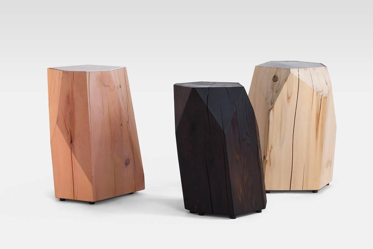 Cast-off cedar logs are given second life as a crystalline form. Named Little Gem, the natural beauty of reclaimed wood is harnessed in this side table and sculpture piece where nature informs design. Each Little Gem is hand-shaped and faceted based