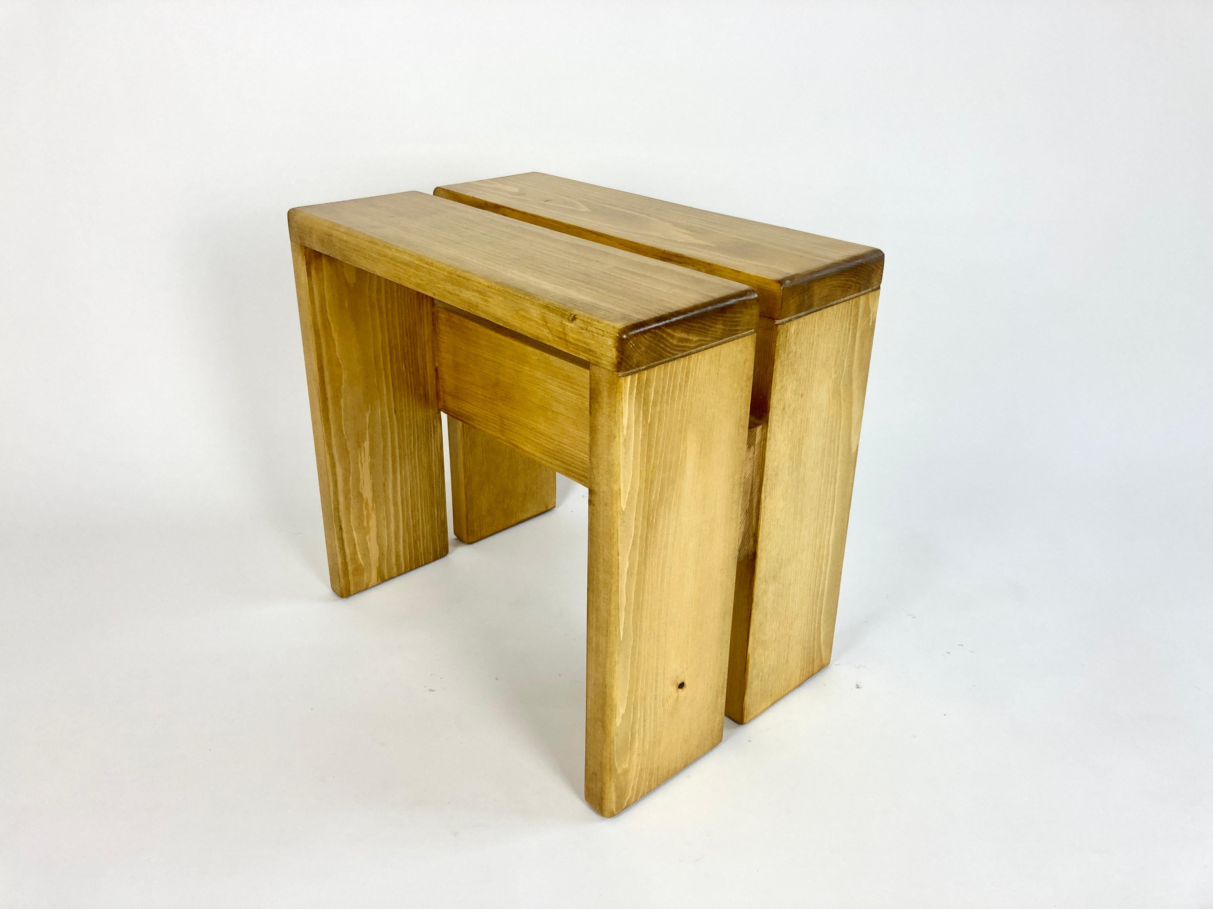 Pine stool, side table or low bench by Charlotte Perriand.

Sourced from a studio apartment in the resort of Les Arcs, France. 

Lovely condition - Signs of wear and us as pictured but no damage or old repairs. Fabulous wood tone and patina.