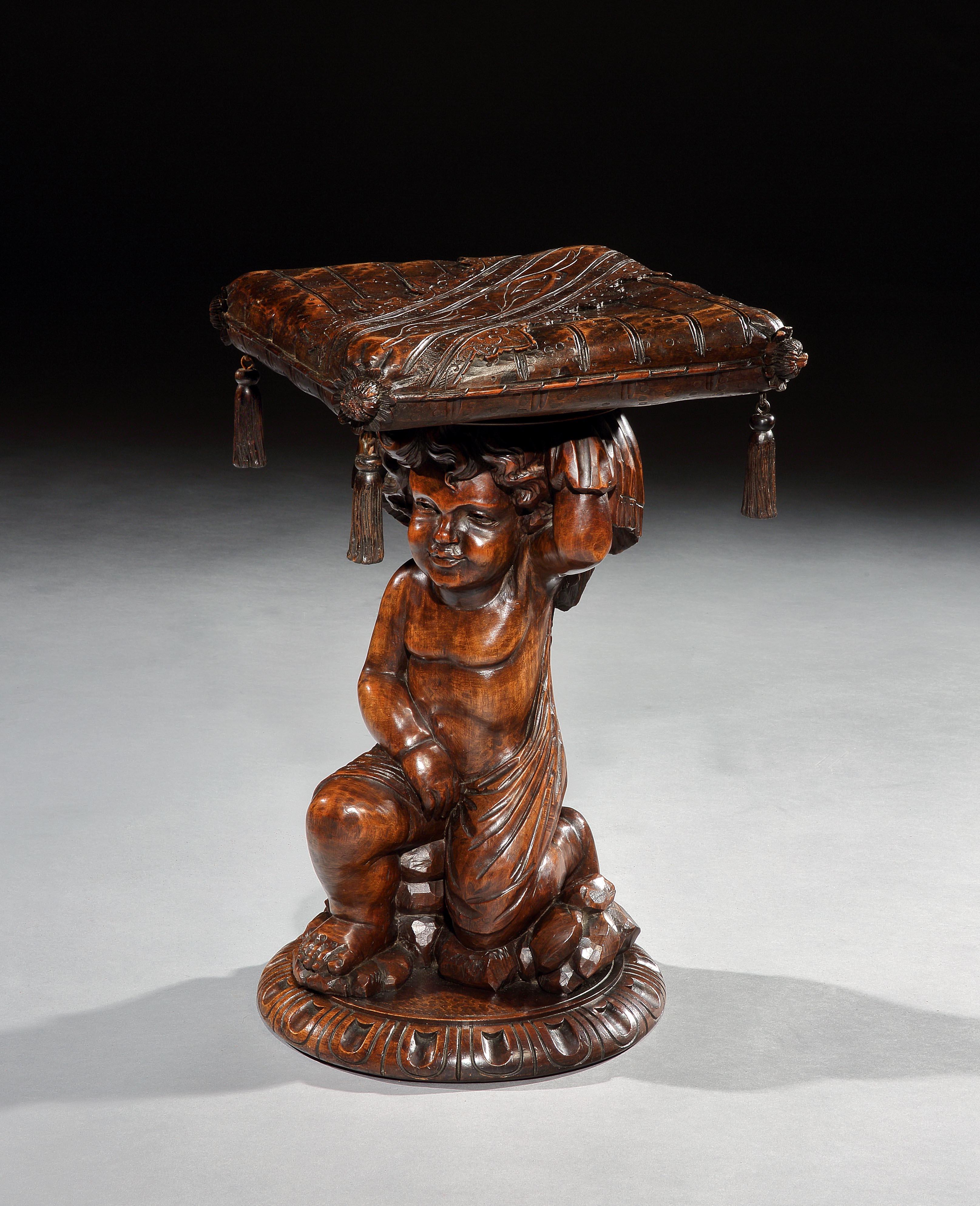 This unusual stool has a fine sculptural quality, combining functionality with artistic merit. The kneeling cherub is in service, holding the elaborate cushion on his head for his master to sit on. 

A fabulous 18th century, Baroque, Venetian,