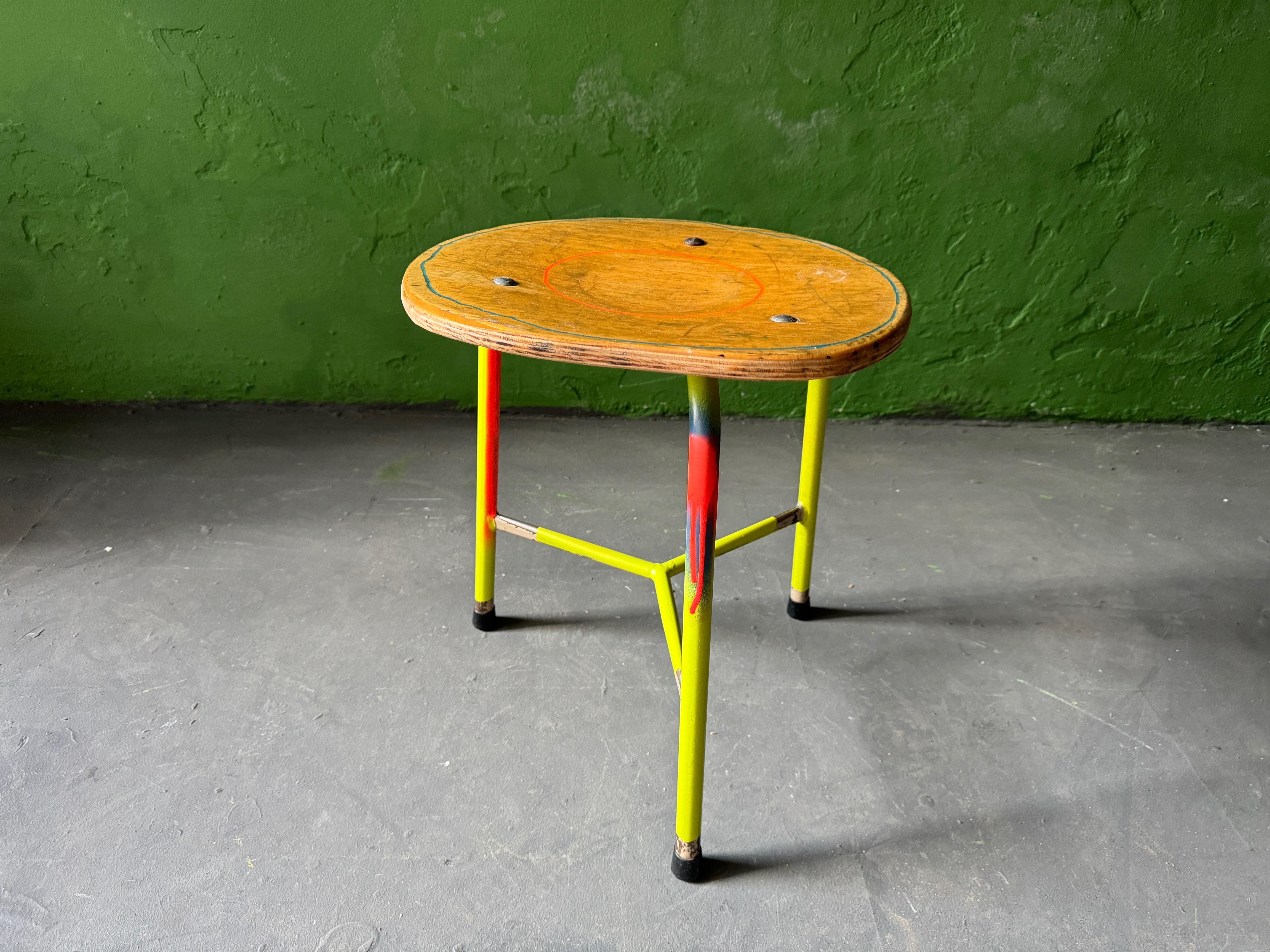 De-constructed stool from ca. 1956, multi painted, spraypainted and lacquered.


•	Info about Markus
•	born 1964 in Aschaffenburg, Germany
•	since  1986 active as a visual artist 
•	since  1989 national and international exhibitions
•	since  2010