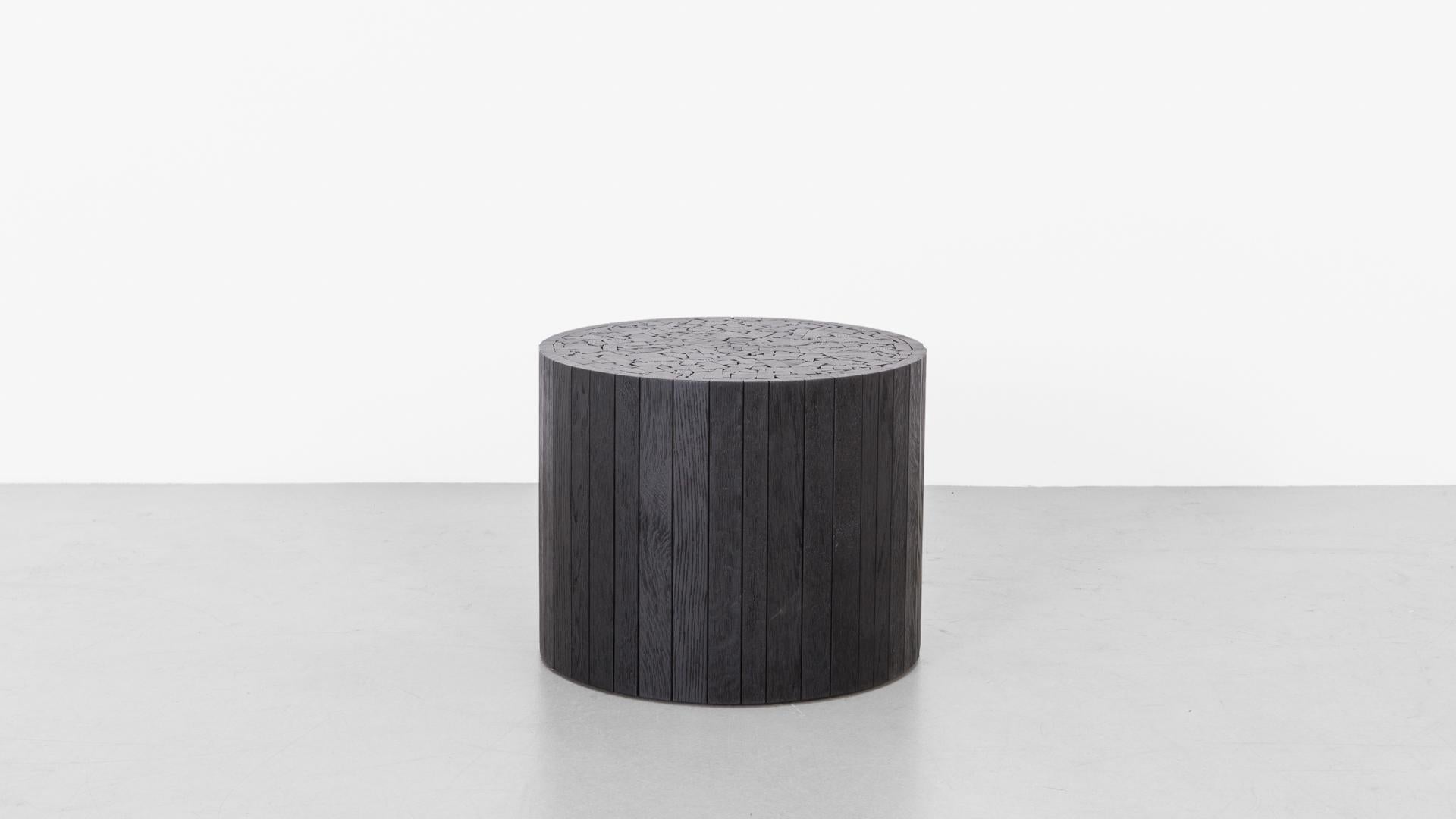 A beloved Uhuru piece, the Stoolen is crafted from black oak offcuts that are carefully hand-fitted into a unique pattern. The Stoolen works well as an end table, stool, or coffee table. Originating from the necessity for materials, our exploration