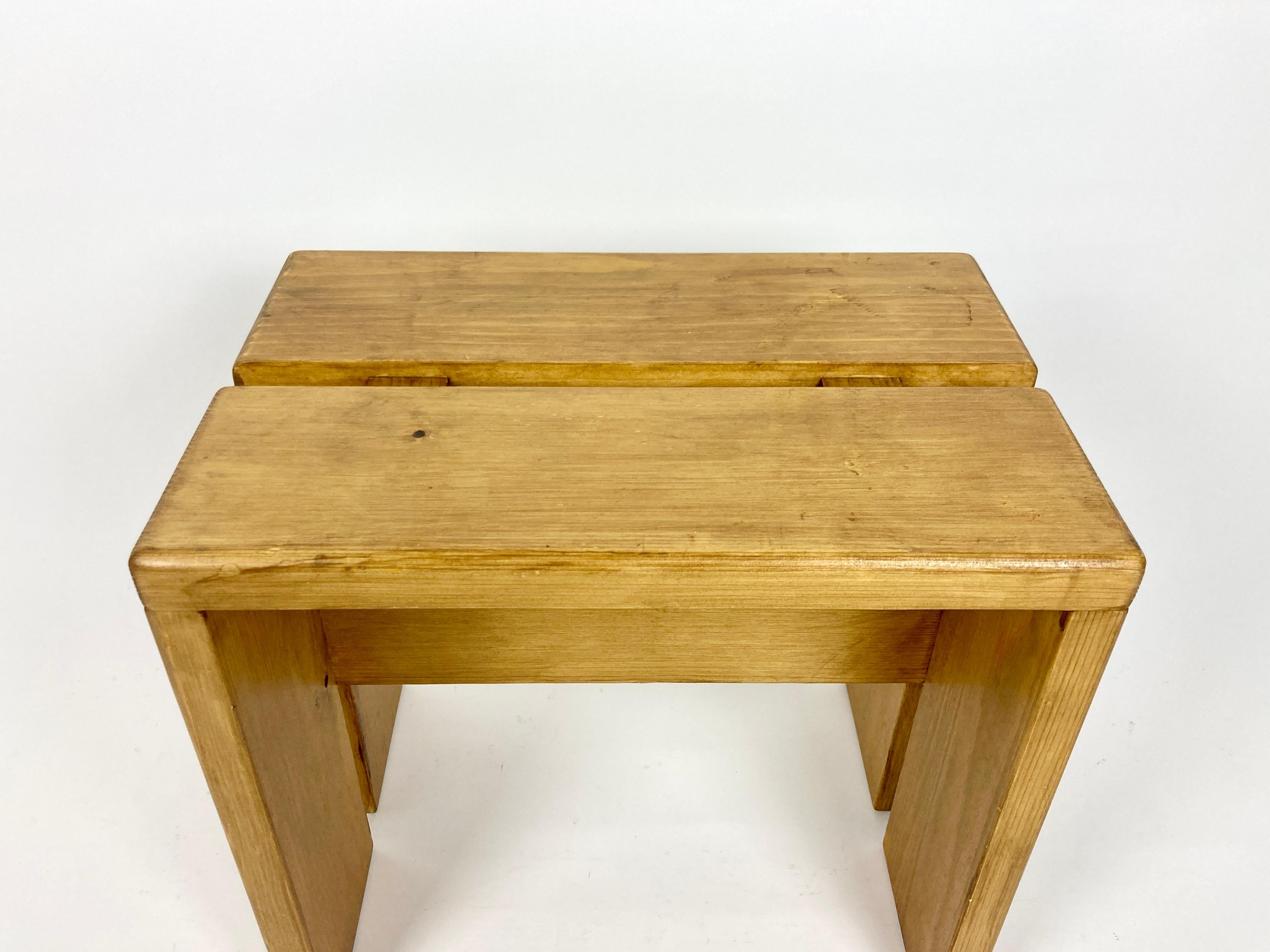 Stool/side table selected by Charlotte Perriand for the Les Arcs resort. France, 1970s.

Made of pine. No structural damage or old repairs, very solid.

Great original condition with wear and patina as pictured, nice rich wood tone. Cleaned, ready