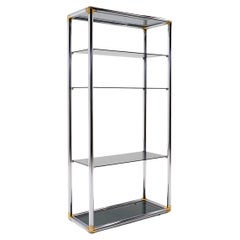 Estantería de almacenamiento / exposición en cromo y latón con estantes de cristal ahumado