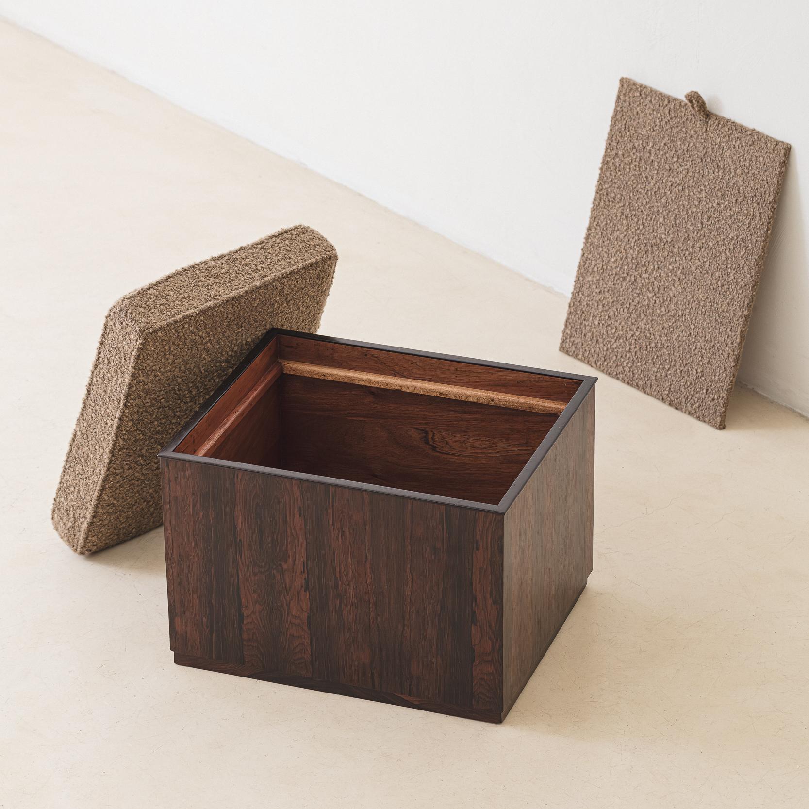 Produced in the 1960s by Celina Decorações, this storage unit consists of a plywood box with Rosewood veneers, with a fabric cushion on top, that transforms it into an ottoman.

Founded in 1938 in Rio de Janeiro, Celina Decorações became a