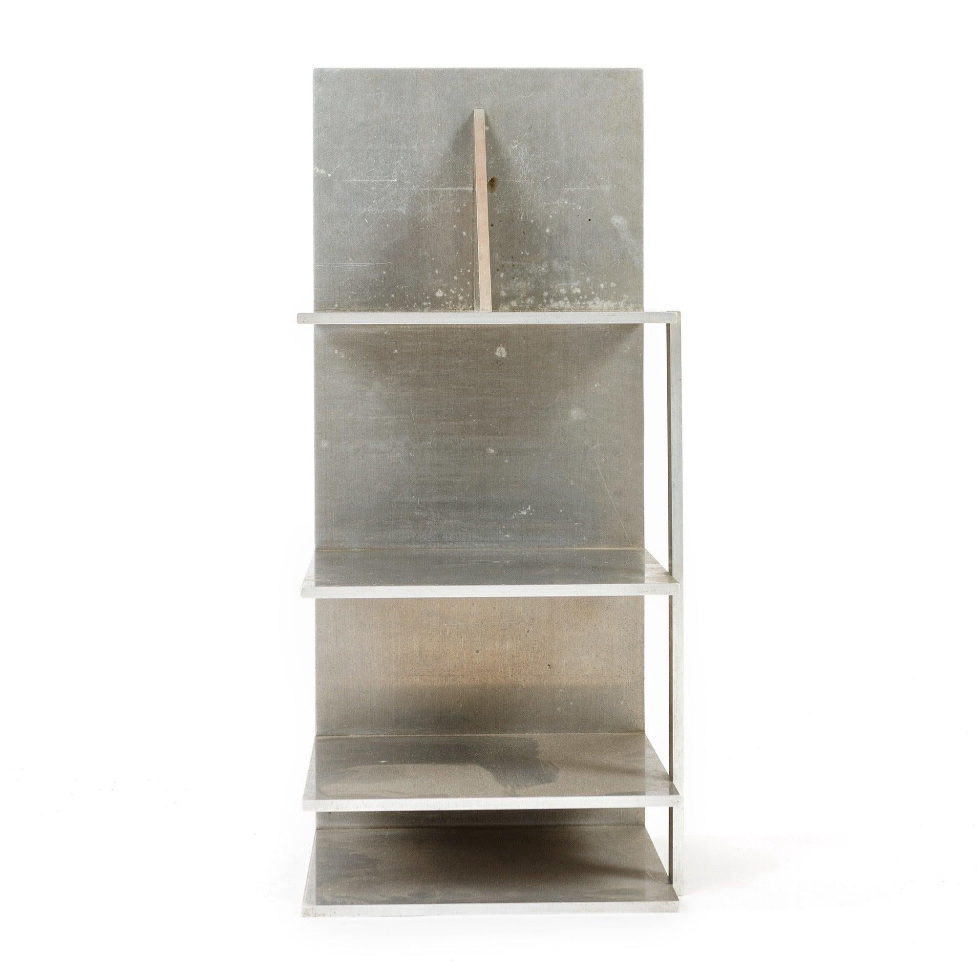 Aesthetically interesting unique and finely crafted modernist open storage unit in machined aluminum. Likely intended for personal use by the individual who crafted it.?