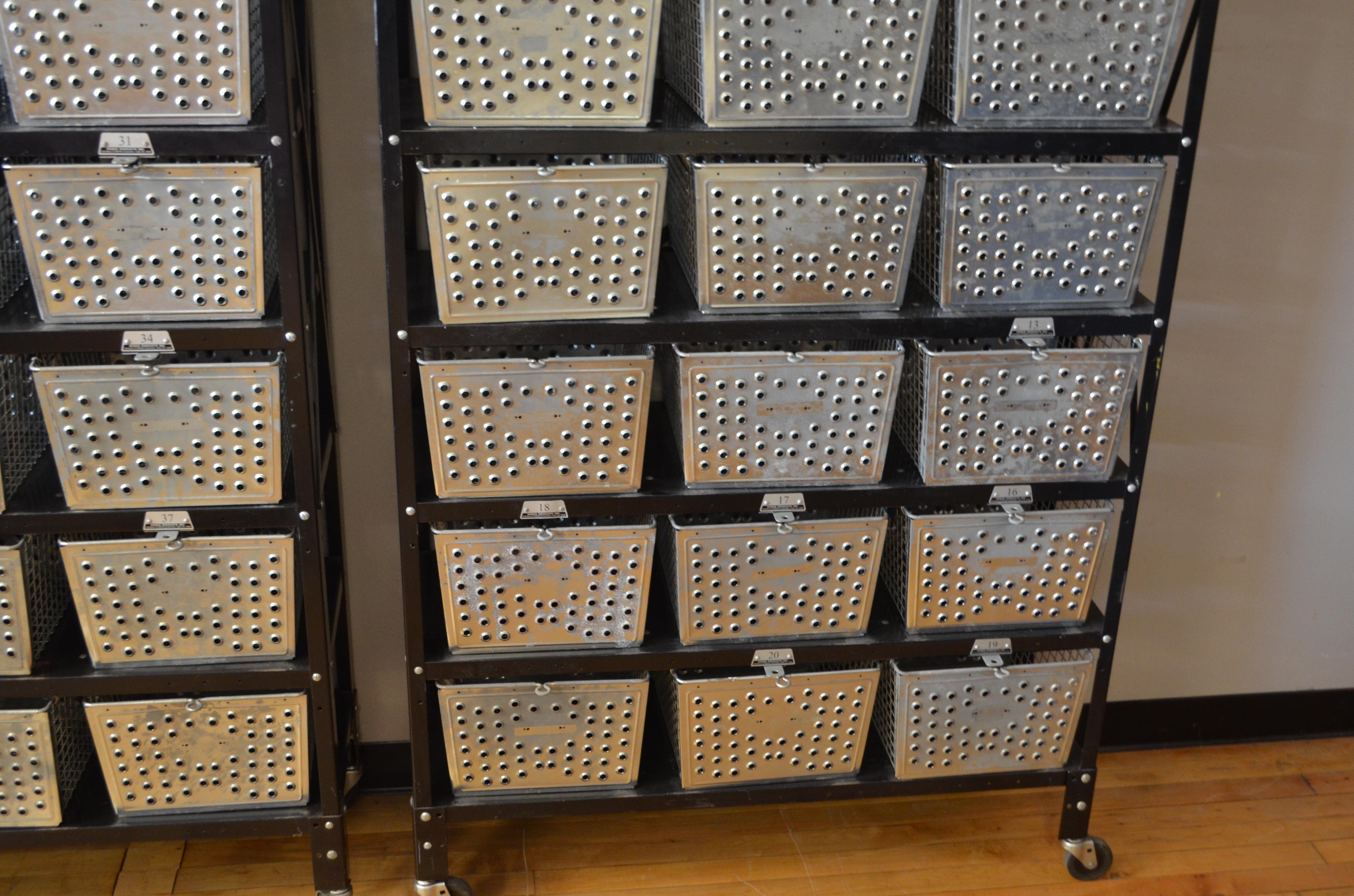 Storage Unit of 21 Swim Locker Wire Baskets on Wheeled Steel Rack For Sale 6