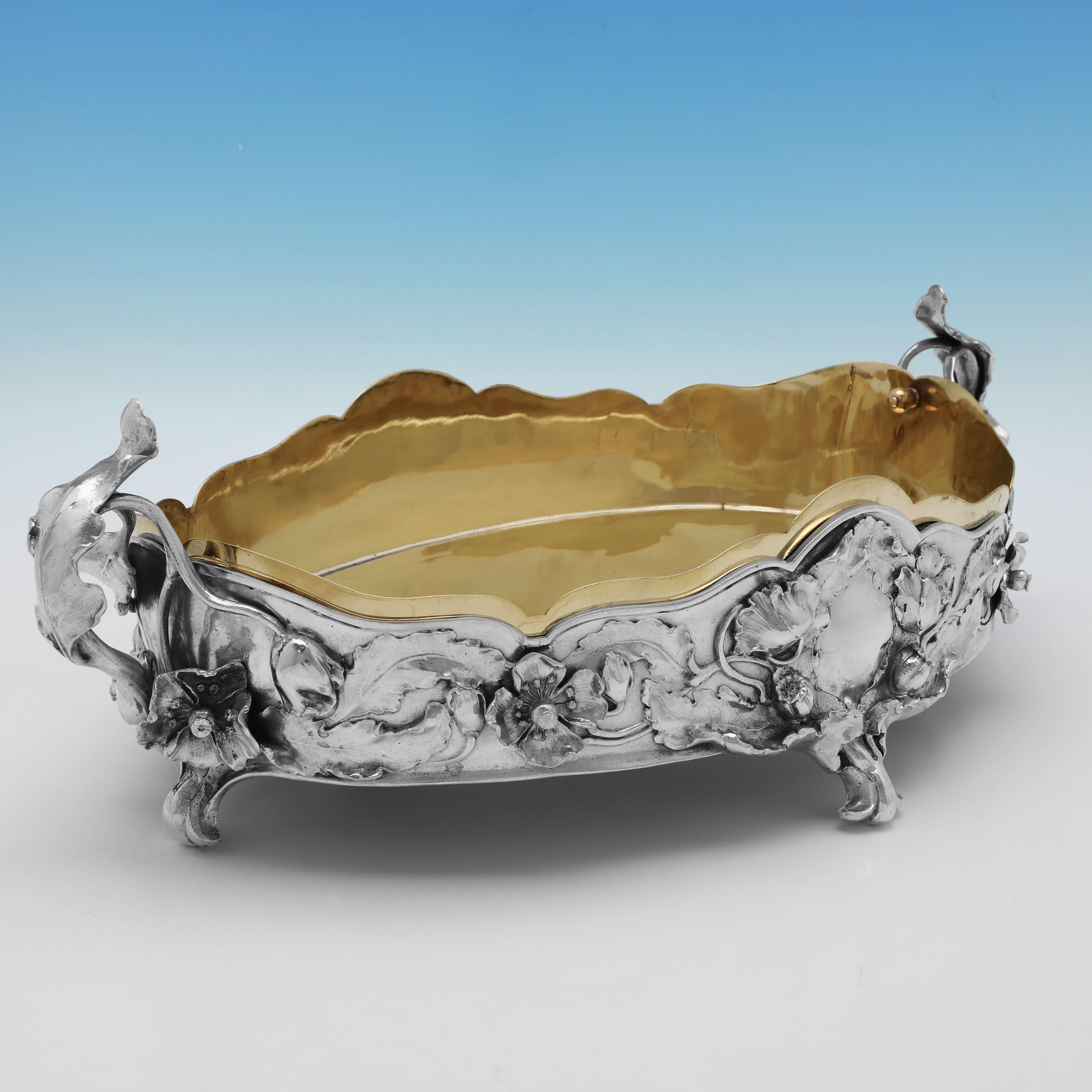 Made circa 1890 in Hanau by Storck & Sinsheimer, this striking, 800 standard, Antique Silver Jardinière, is in the Art Nouveau taste, and features a removable gilt metal liner. 

The jardinière measures 6