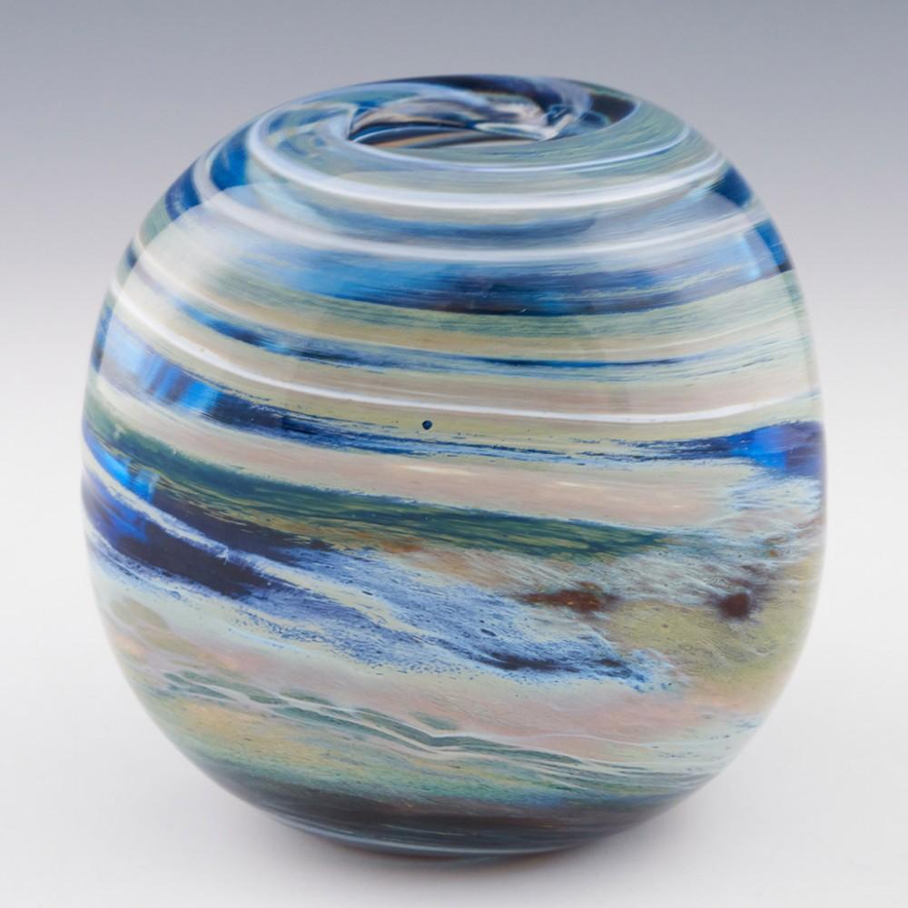 Storm clouds a studio glass vase from 2022 made by Siddy Langley in Devon England. Dimpled triangular cross-section. Striated polychrome bands.
Marks : Signed and dated Siddy Langley 2022

Weight : 932 grams. 

Siddy Langley is one of the
