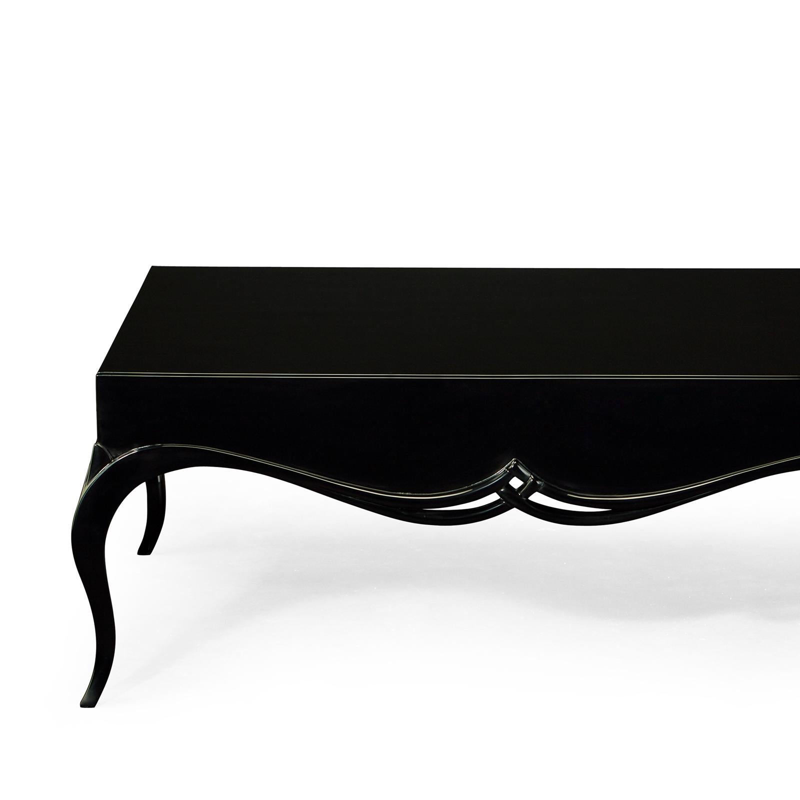 Coffee table stormy made with solid mahogany
wood. All black veneered finish. With subtle saber
feet.
Also available in white veneered.
Also available in side table stormy.