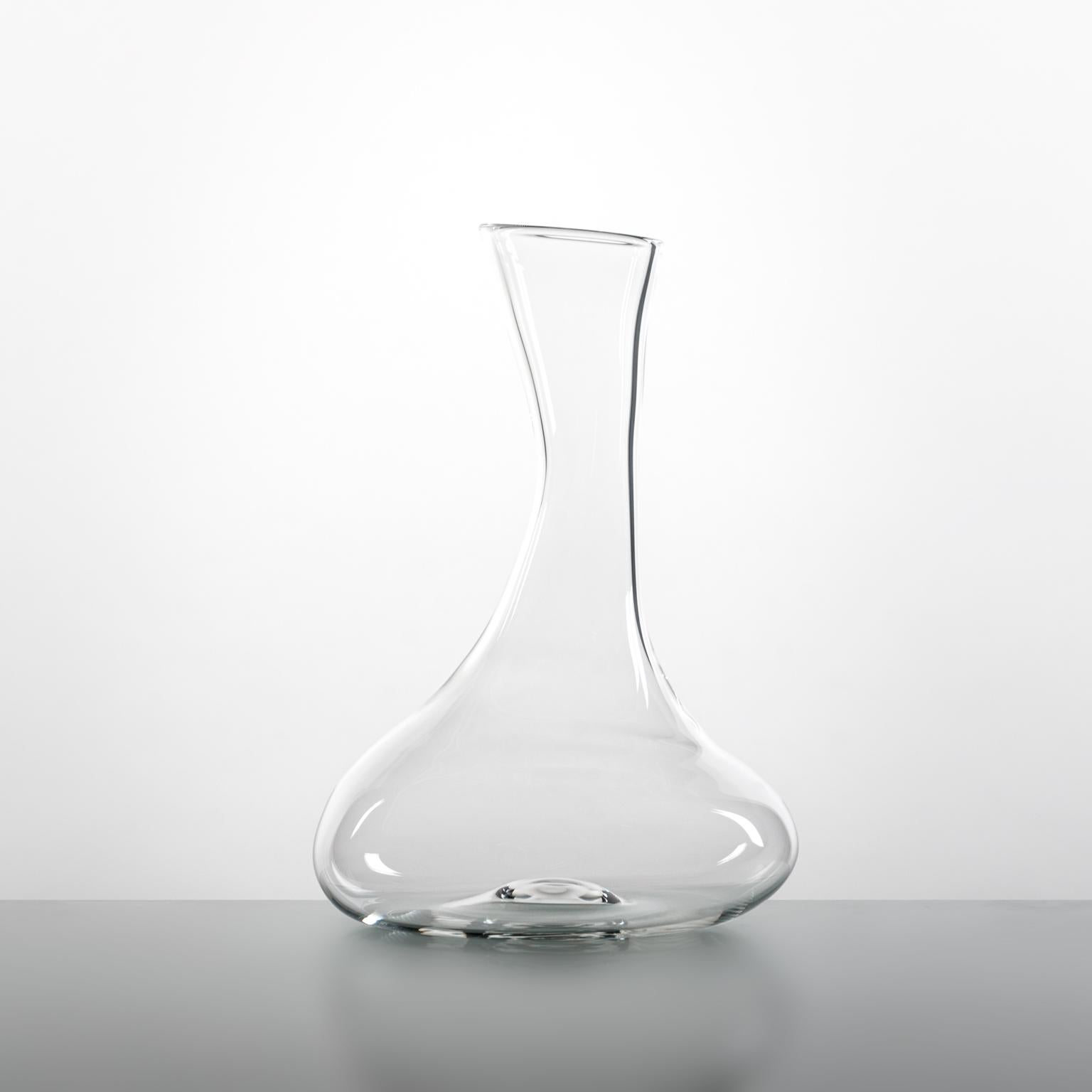 A Hand-Blown Glass Decanter by Simone Crestani

The Storti Decanter is a charmingly unique creation, part of the Storti Collection by Simone Crestani. With a design that embraces imperfection, the decanter takes its shape spontaneously, as though