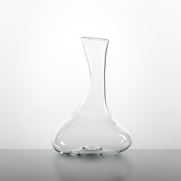 'Storti Decanter'
A hand blown glass decanter by Simone Crestani. 

The decanter can easily contain a bottle of wine.

'Storti Decanter is one of the pieces from the Storti Collection.'

'Storti', like in a kid's drawing, lines are not forced