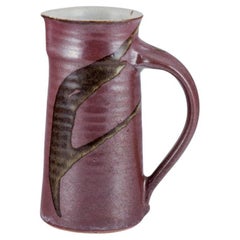Stouby Keramik, Denmark. Ceramic jug with glaze in brown and sandy tones