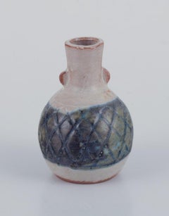 Stouby Keramik, Denmark. Collection of nine miniature ceramic vases.