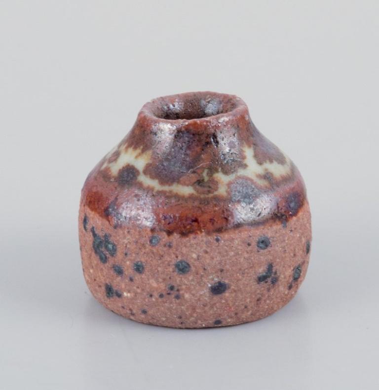Ceramic Stouby Keramik, Denmark. Collection of nine miniature ceramic vases. For Sale