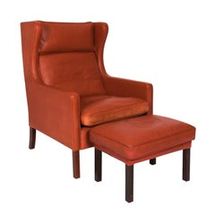 Stouby Leather Wing Chair and Ottoman, Denmark, circa 1970s