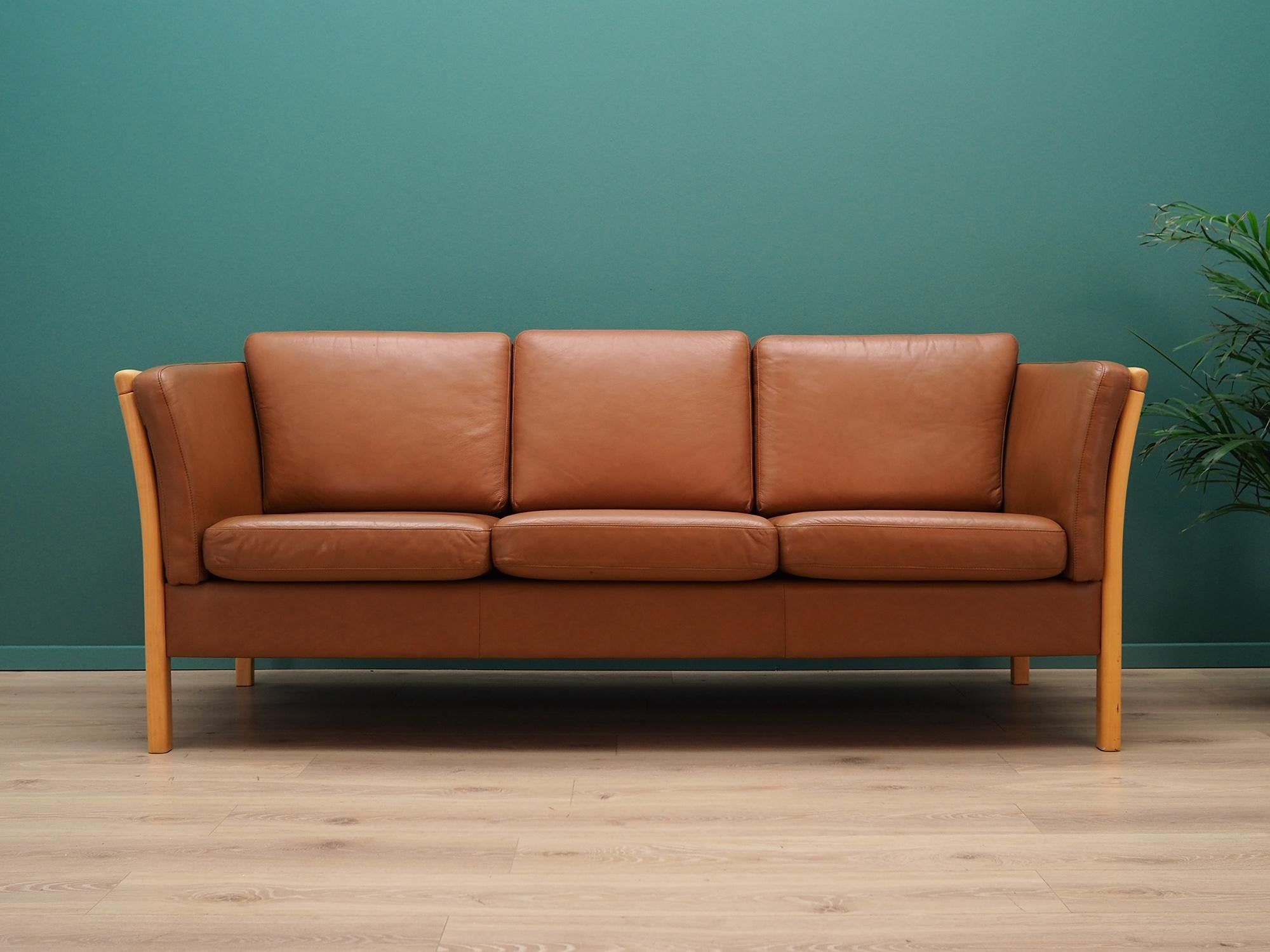 Fantastic sofa from the 1960s-1970s. Scandinavian design, Minimalist form. Manufactured in the Stouby workshop. Original upholstery made of leather in brown, beech construction. Preserved in good condition (minor bruises and scratches) - directly