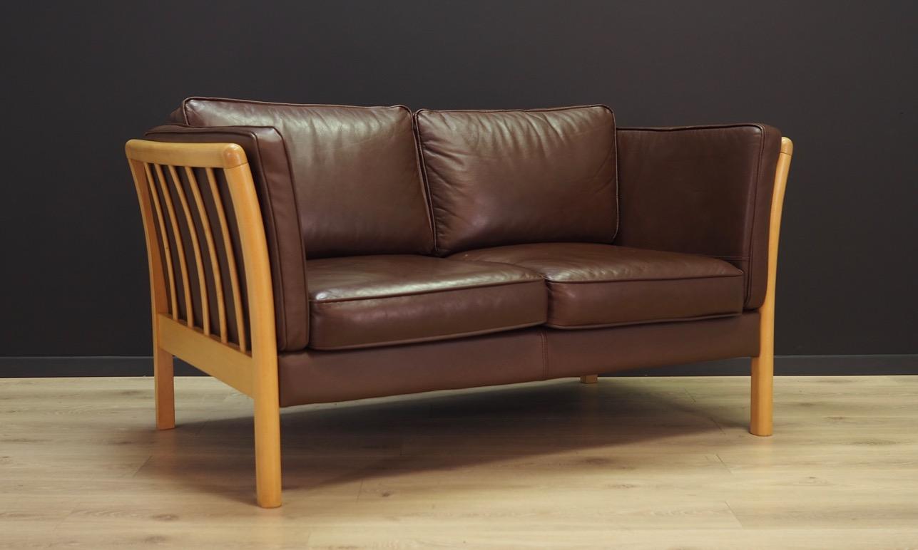 Phenomenal sofa from the 1960s-1970s. Scandinavian design - Minimalist form, precision of workmanship and excellent quality of materials. The sofa was manufactured in Stouby's factory. Original upholstery made of leather. Wooden construction made of