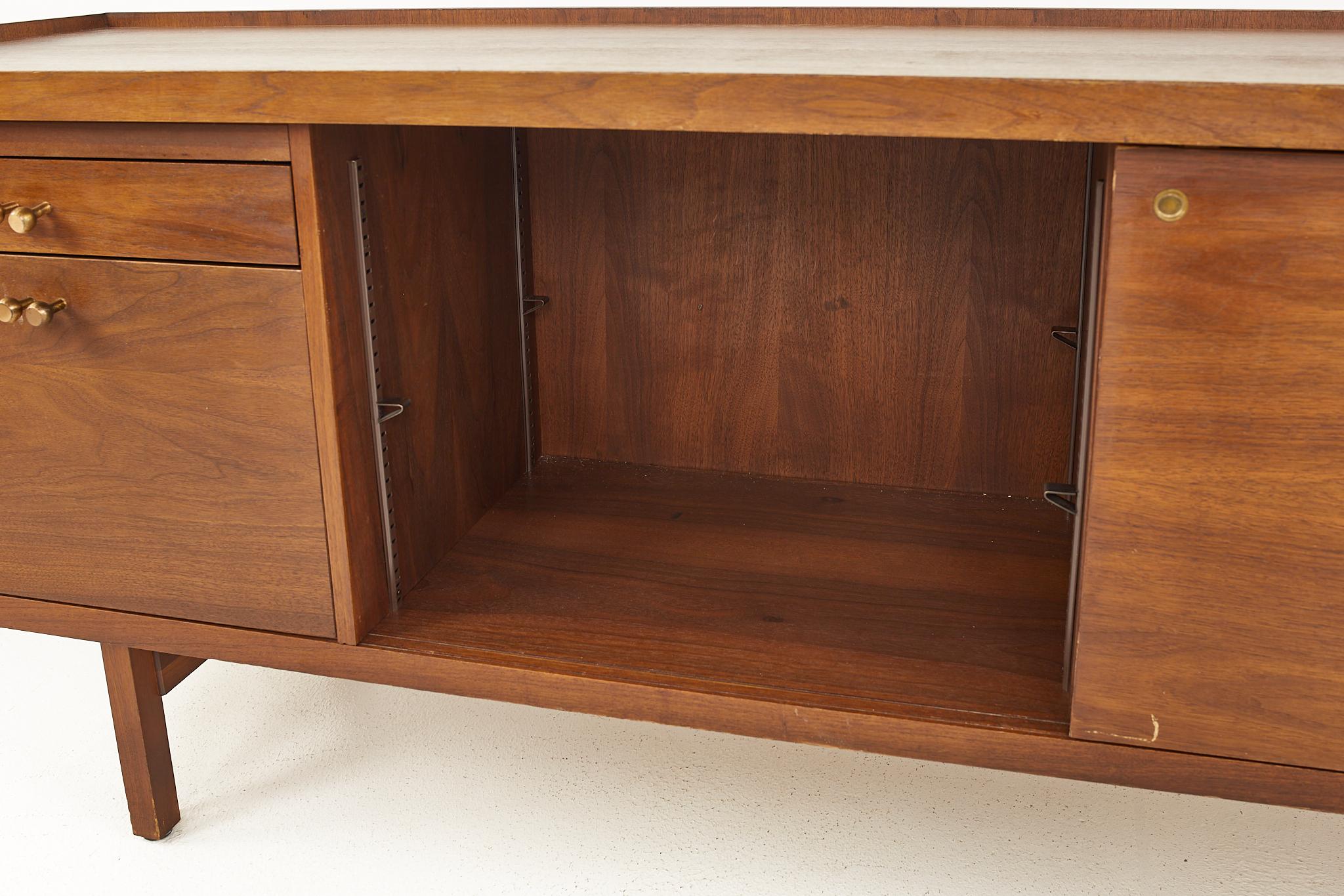 Late 20th Century Stow and Davis Mid-Century Walnut and Brass Sideboard Credenza